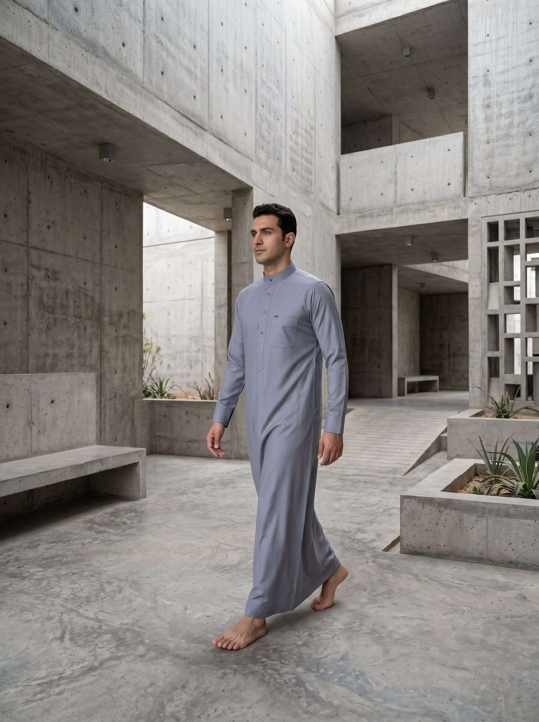Silver gray thobe with button-down placket for men, close-up of the pocket