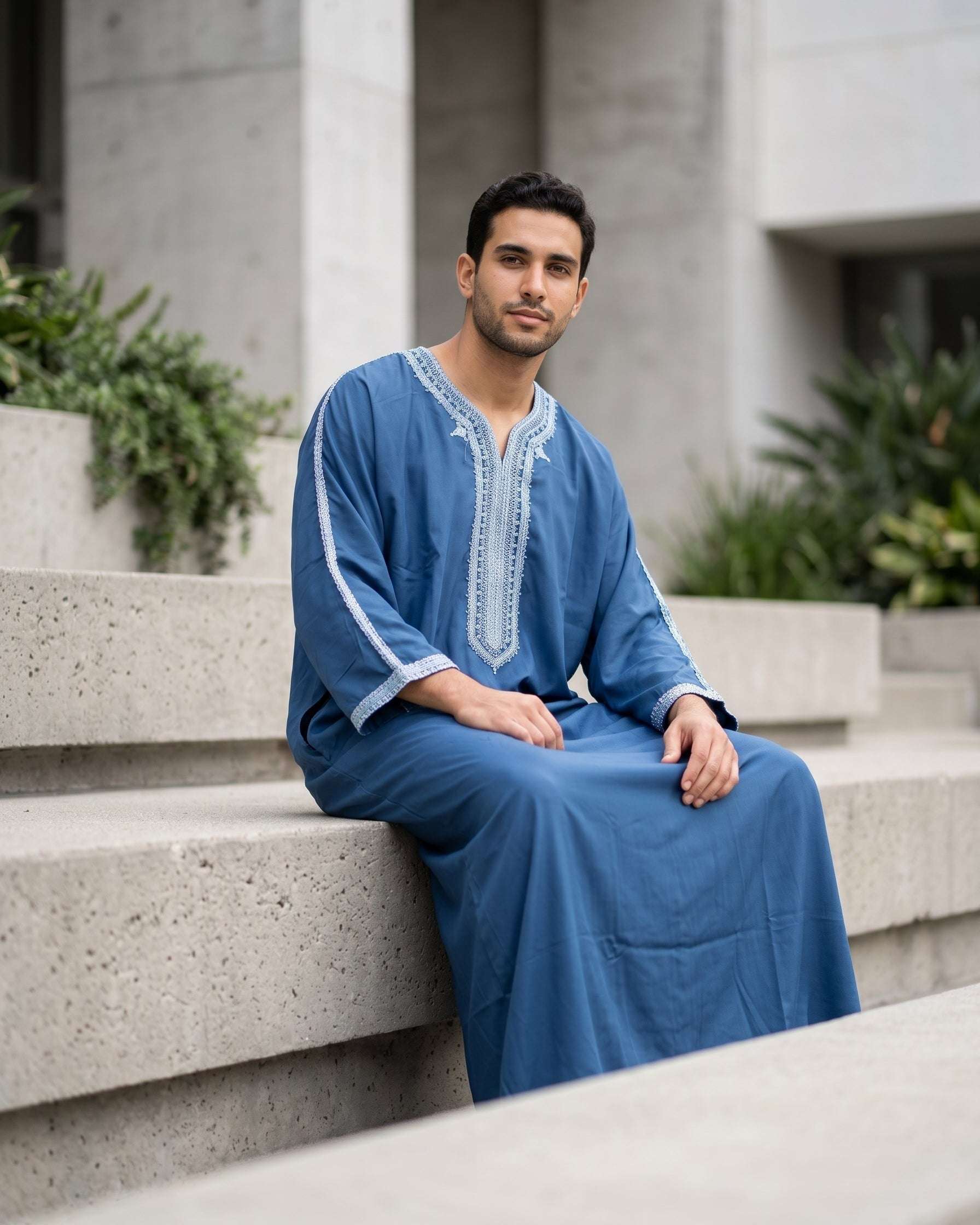 Slate blue Moroccan thobe with silver embroidery for men, side profile view