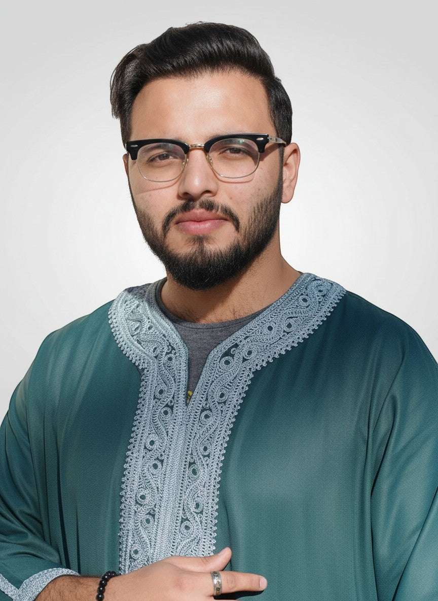 The Topi Wala men's forest green Moroccan thobe with intricate light blue embroidery on the neckline and placket. Lightweight, breathable fabric.