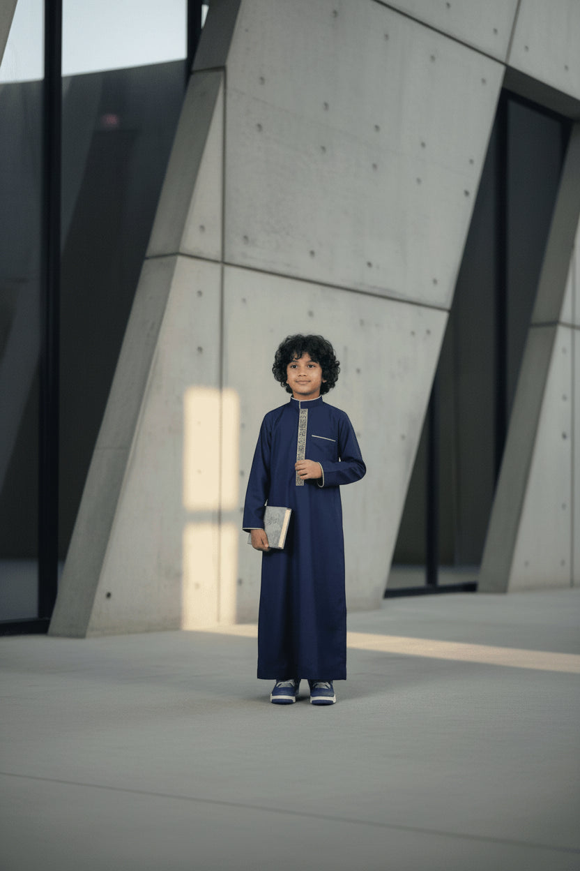 Navy blue embroidered thobe for boys, stitched pattern in close detail