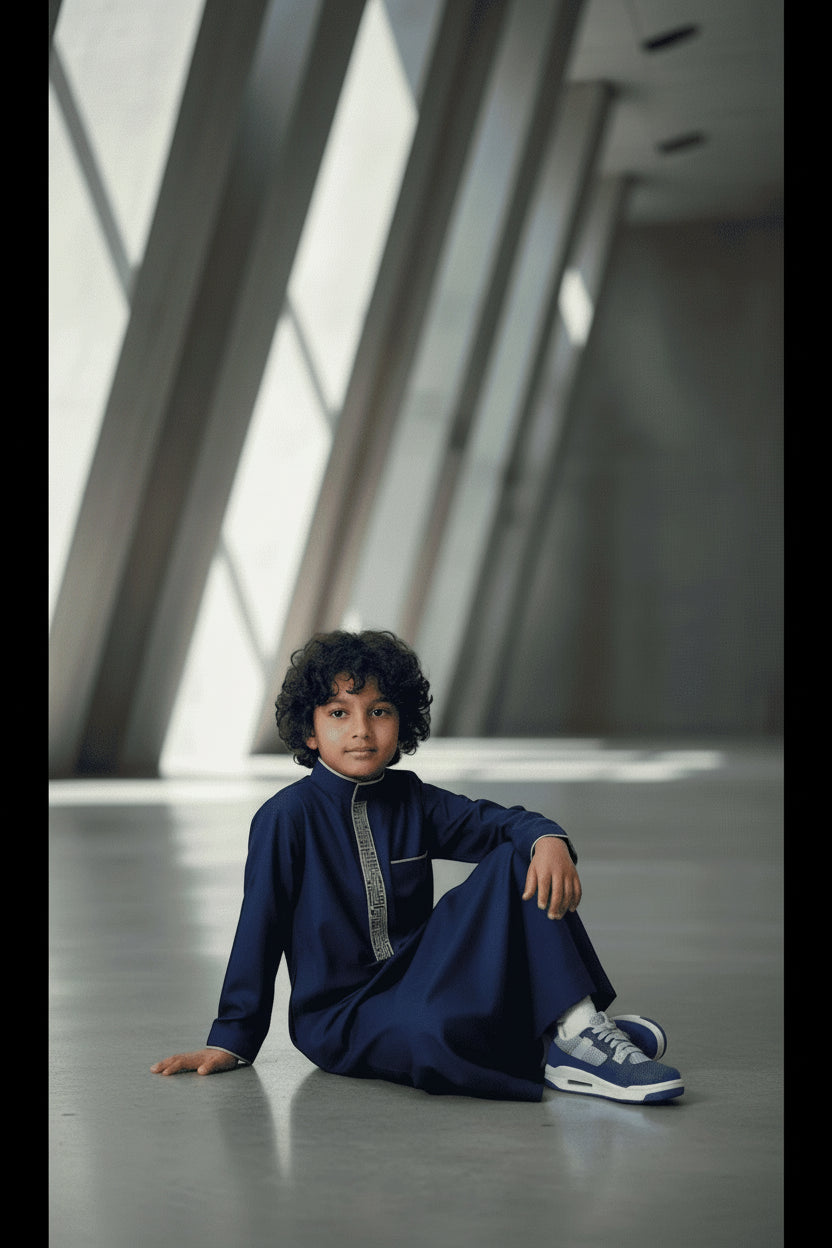 Navy blue embroidered thobe for boys, a closer look at the finish