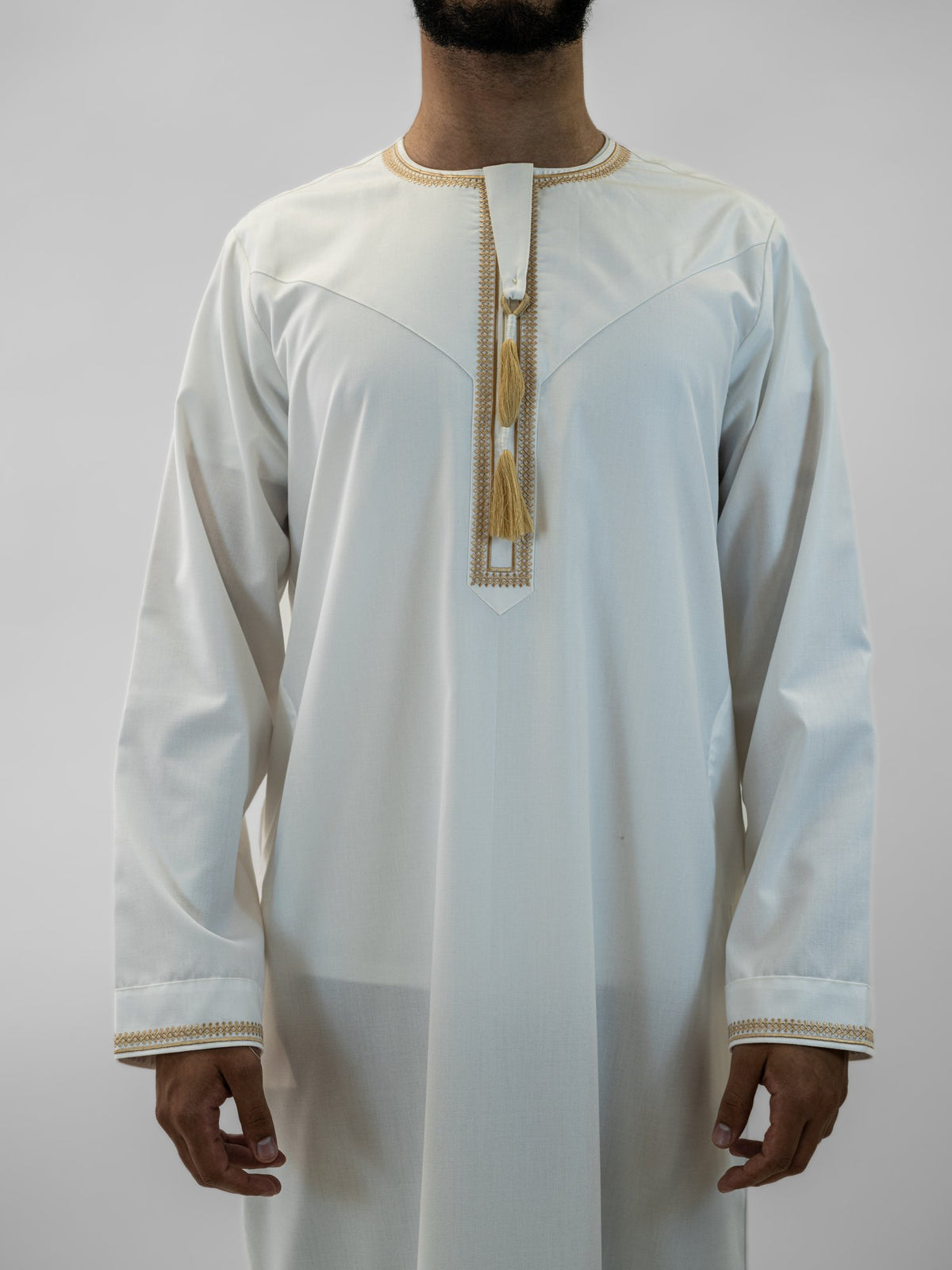 White emirati with tarboush cap thobe for men, close-up of the fabric