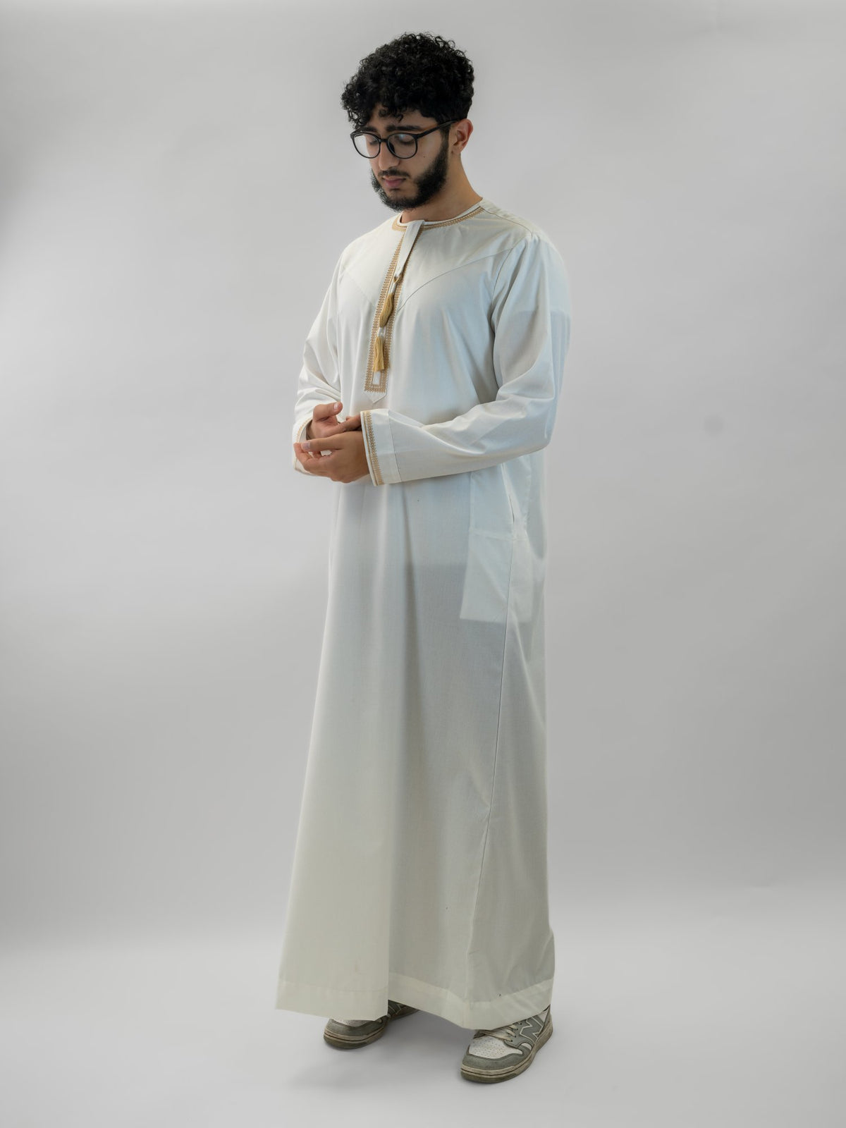 White emirati with tarboush cap thobe for men, side profile view