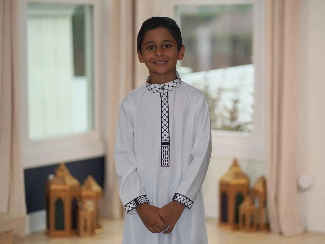 White jubba with Kufiya embroidery for boys, close-up of the sleeve cuff