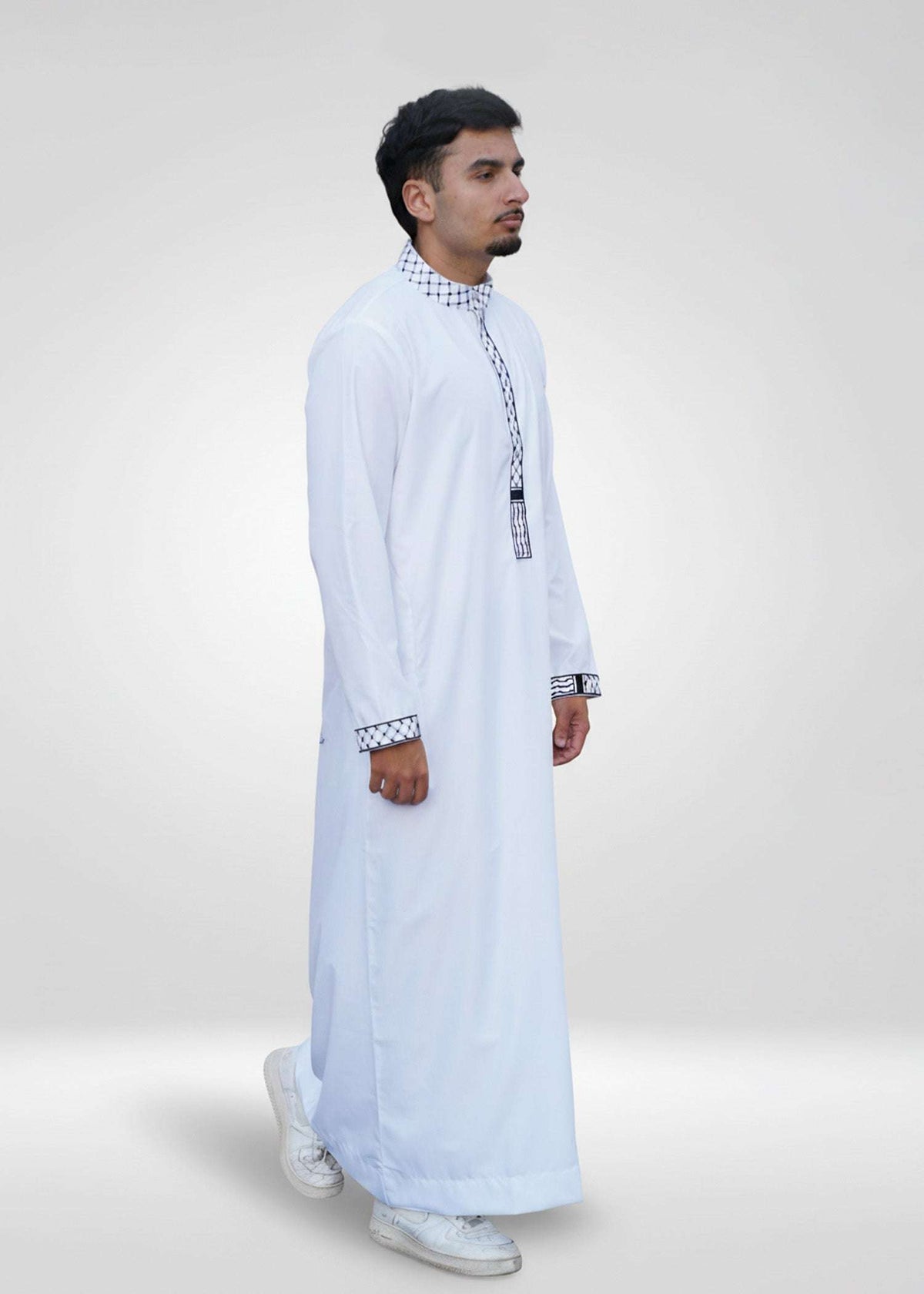 White Palestine embroidered thobe with Kufiya detailing for men, shown from behind