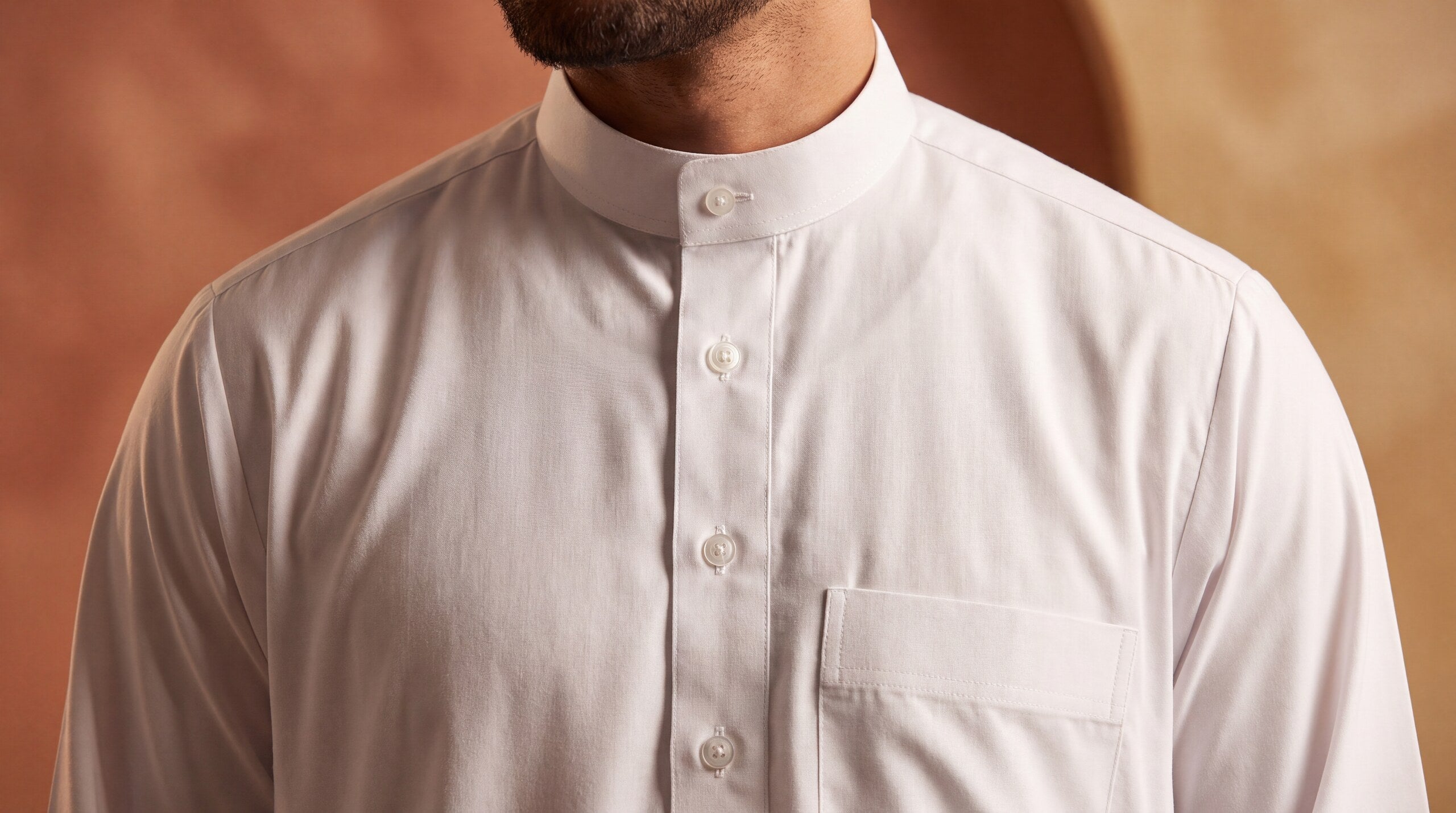 Man wearing a classic white thobe
