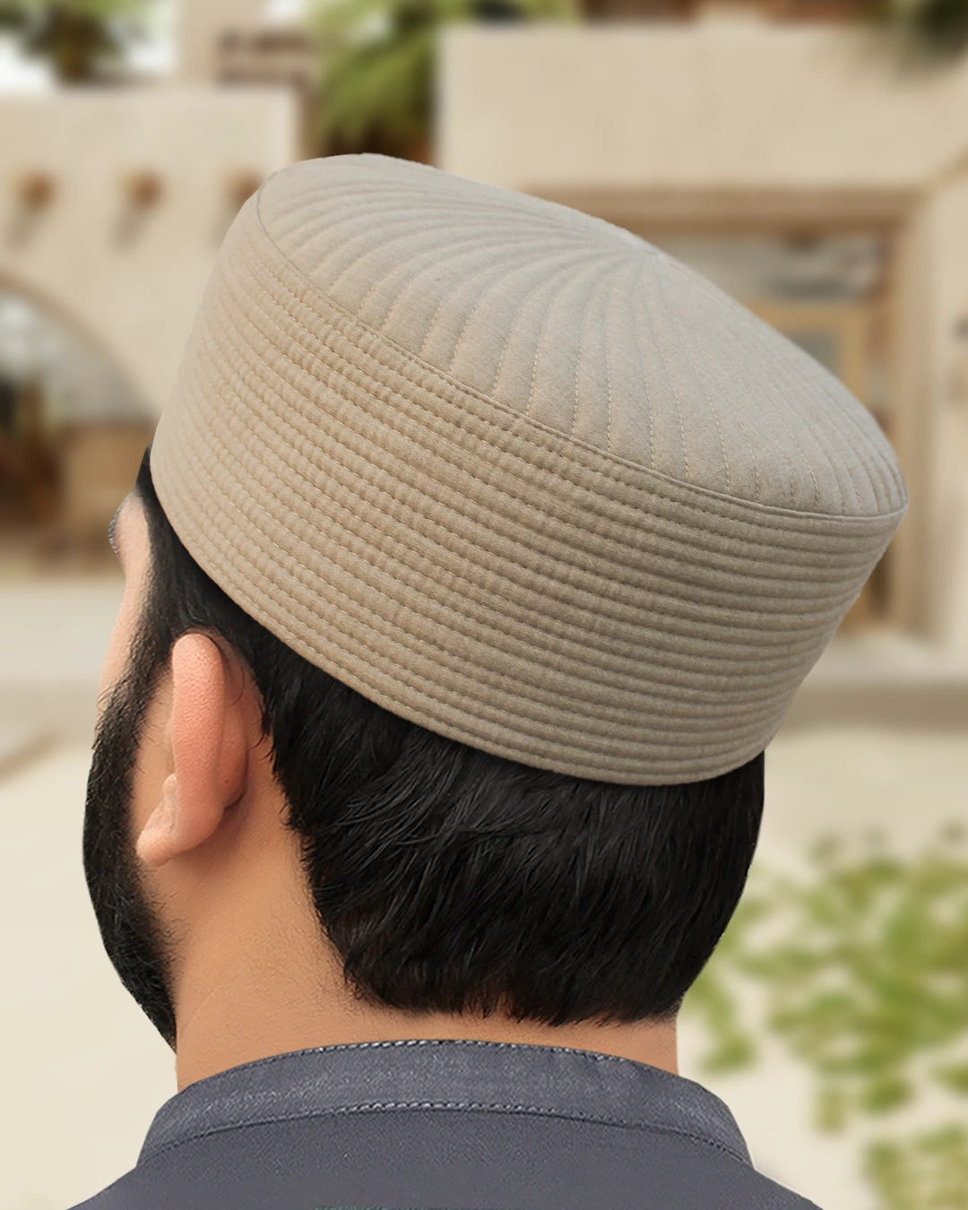 Model wearing the Rocky Ridge Fajr Kufi, demonstrating the perfect fit for Salah.