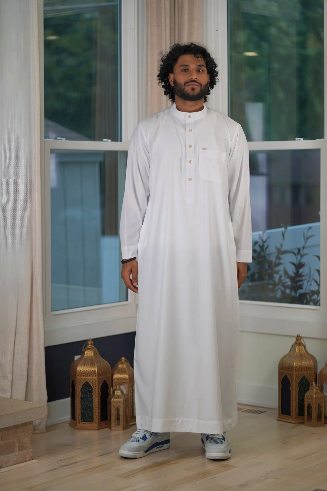 Front view of the Plain White Thobe showing the crisp fabric and classic mandarin collar