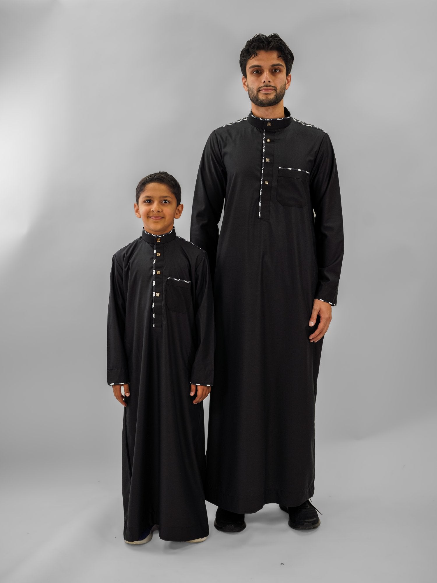 Black embroidered mandarin collar thobe for men, stitched pattern in close detail