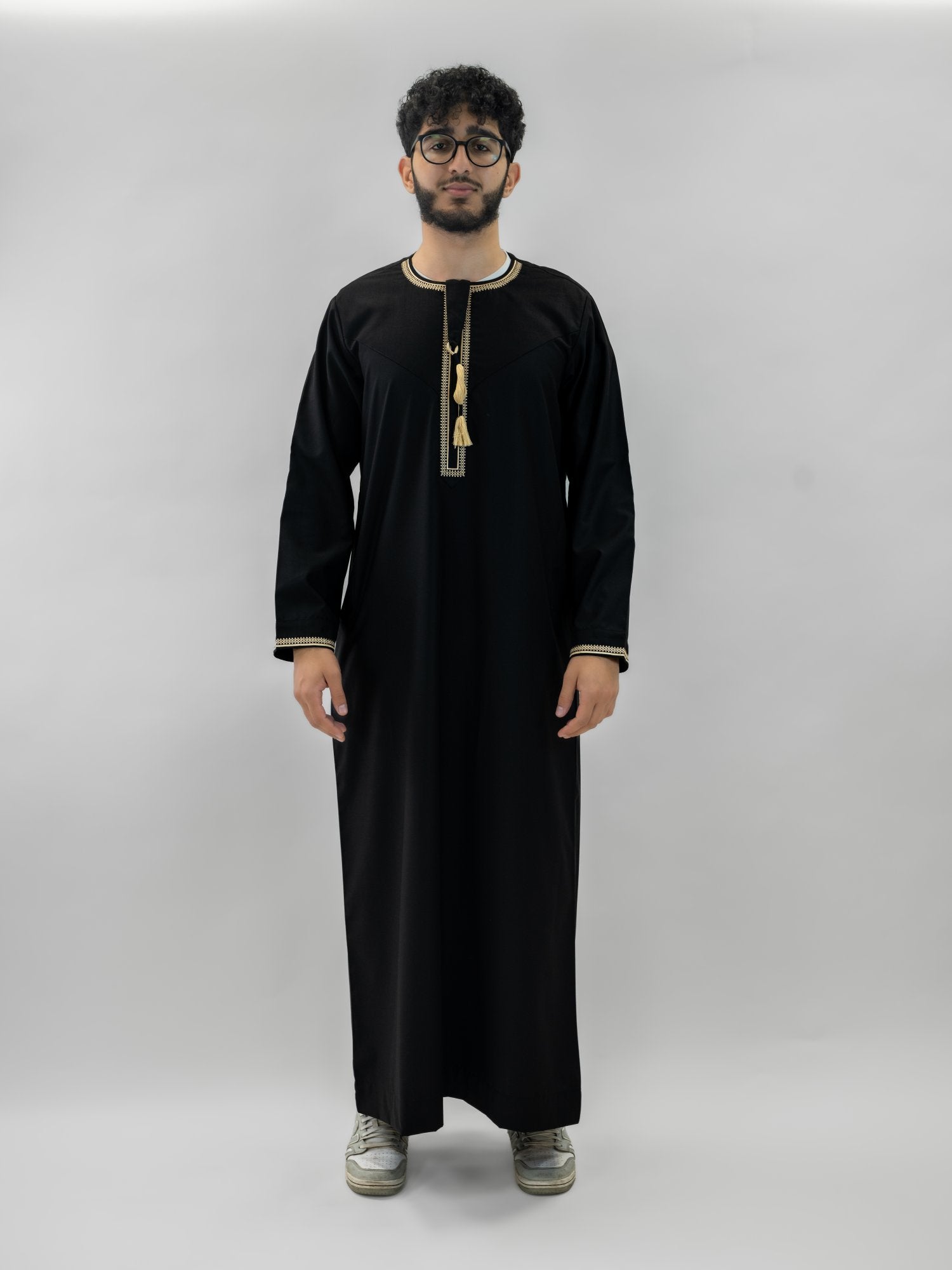 Black emirati gold trim tarboush thobe for men and boys, back view