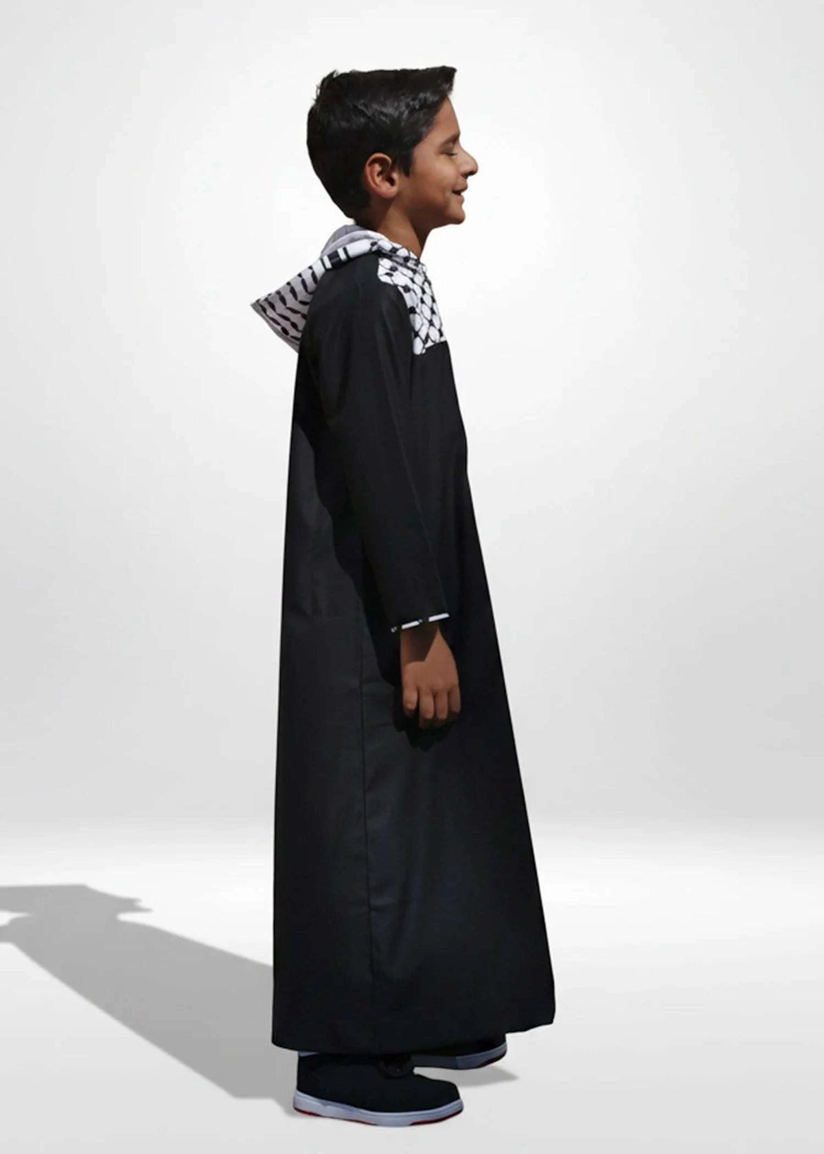 Black Kufiya hoodie thobe with Palestinian pattern for boys, back view