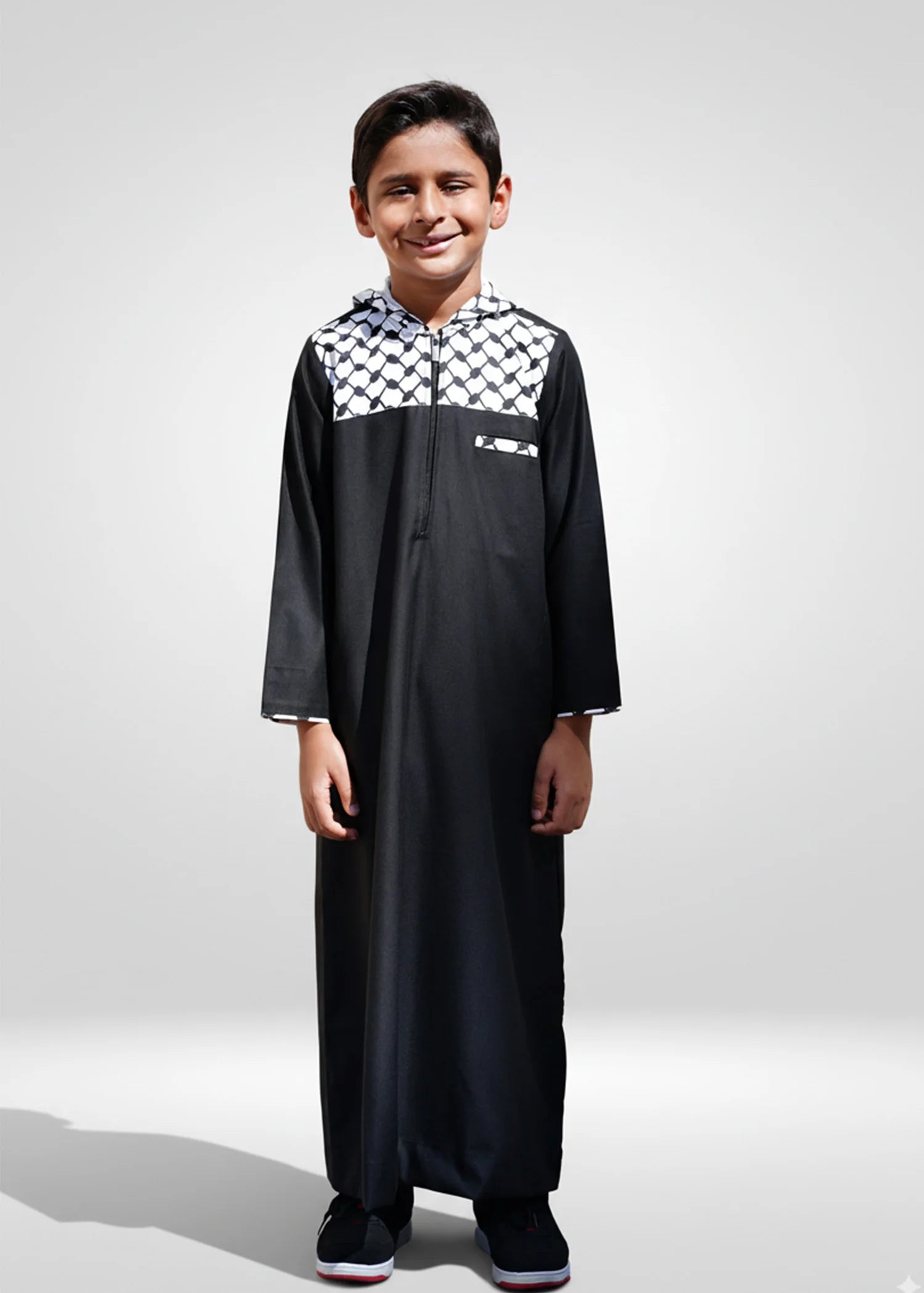 Front view of the Black Palestine Hoodie Kids Thobe featuring a modern hood and kufiya pattern