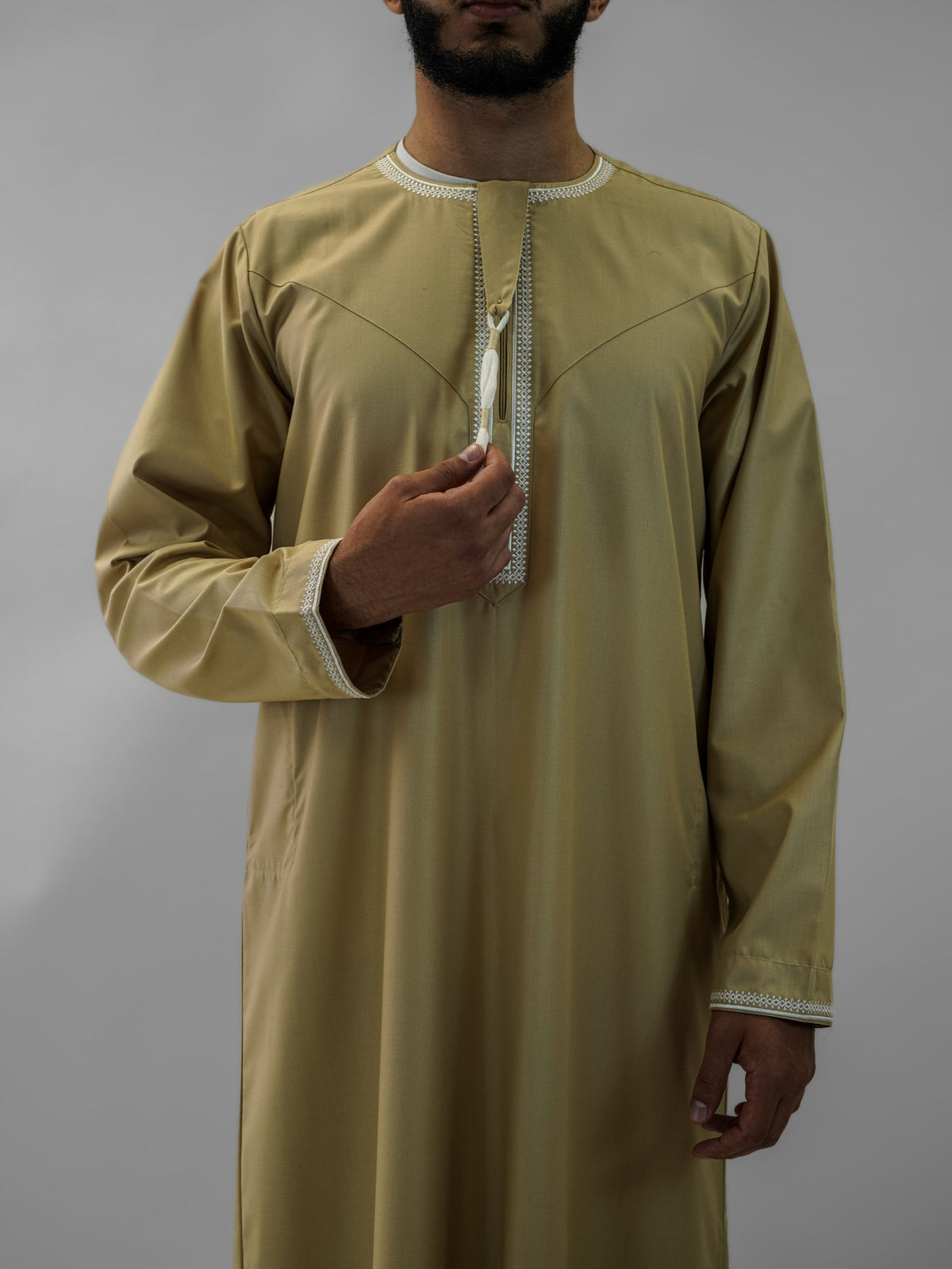 Camel emirati classic tarboush thobe for men, close-up of the fabric