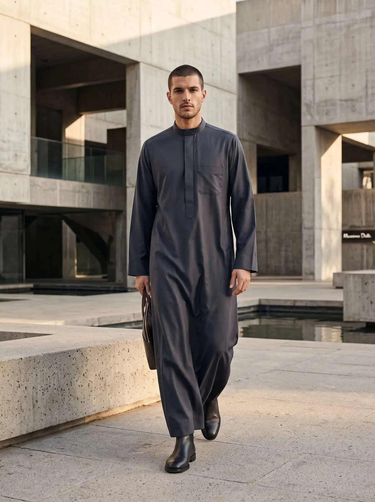 Charcoal minimalist thobe with hidden placket for men, shown from the front