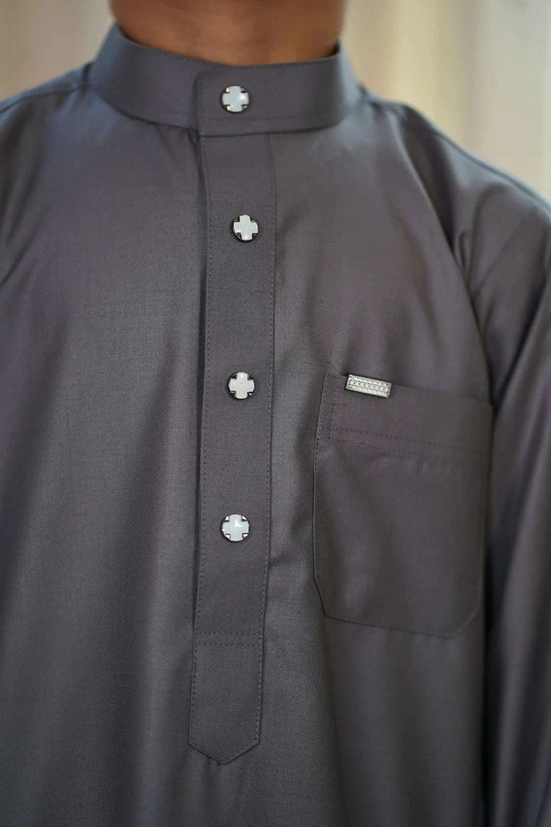 Charcoal thobe for boys, shown from the front