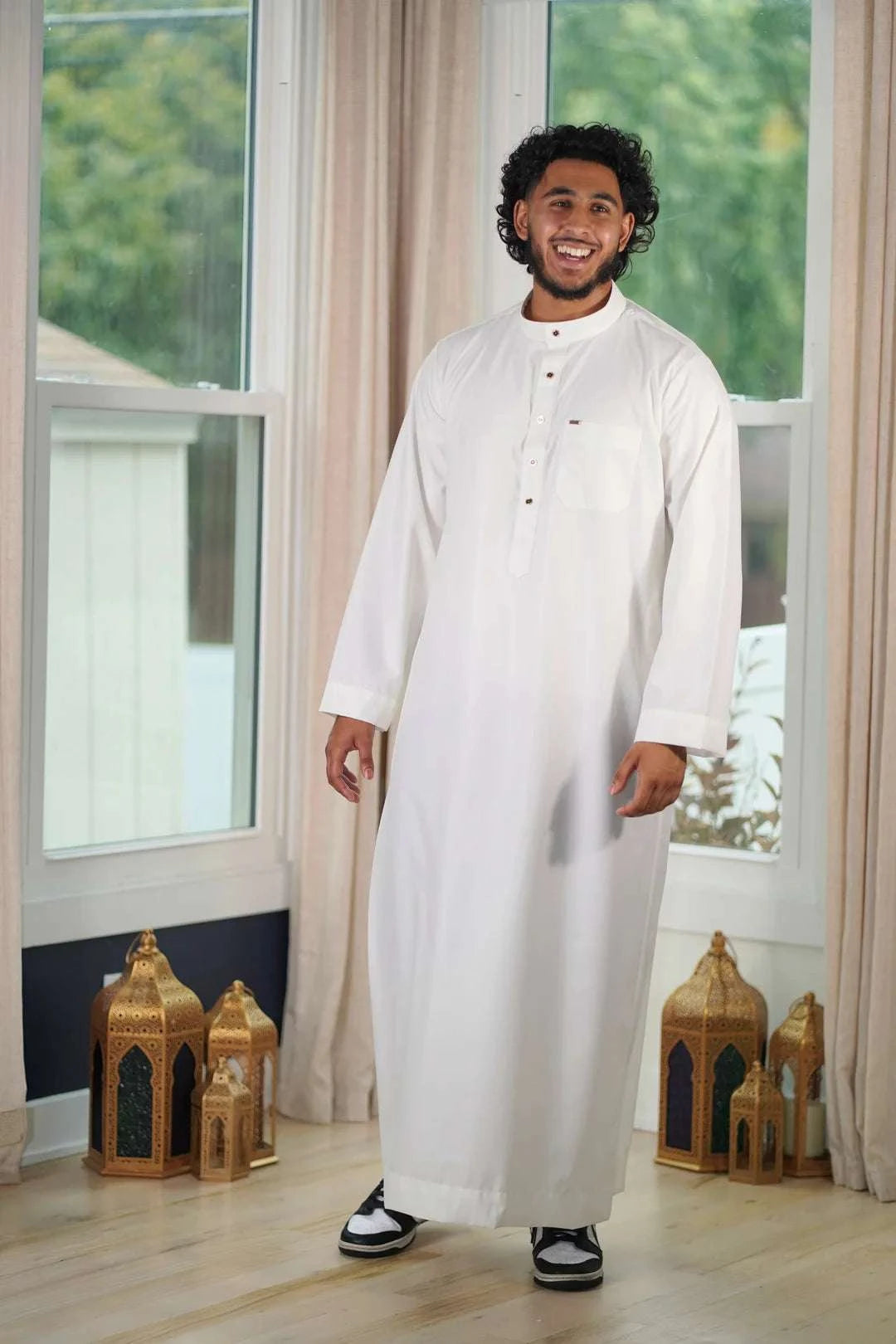 Cream thobe with button placket for men, back view