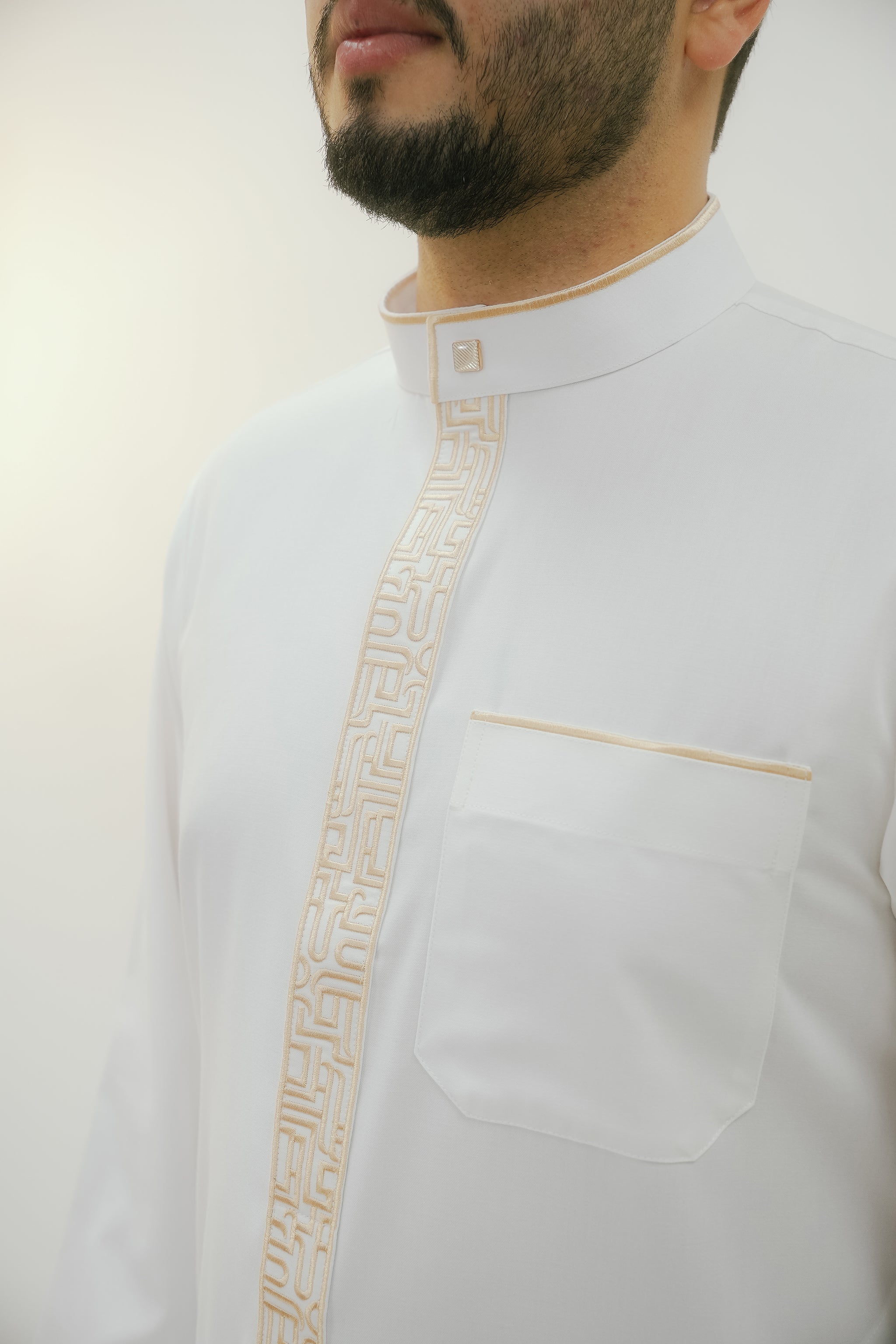 Cream embroidered thobe with gold mandarin collar for men, another full-length view