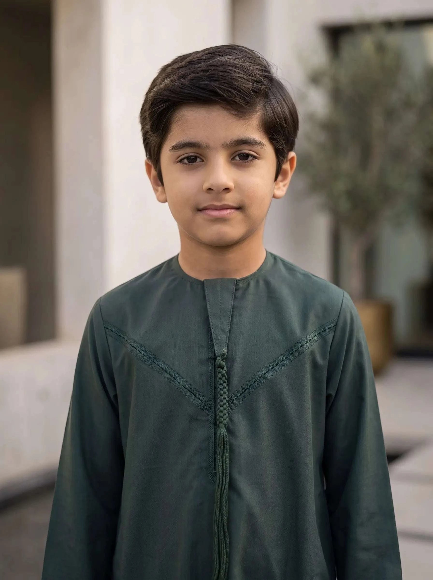 Dark green Emirati thobe for boys, close-up of the fabric