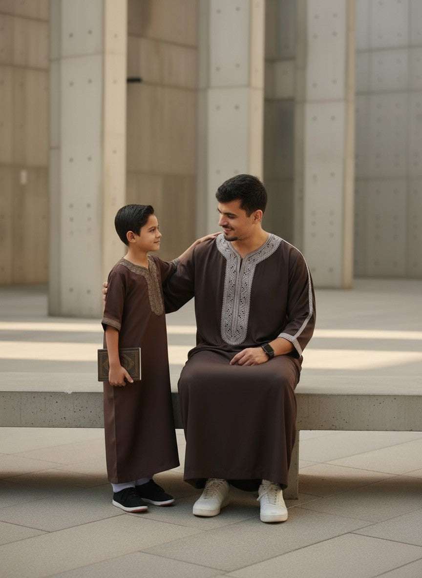 Espresso brown Moroccan thobe for men and boys, worn by a model outdoors