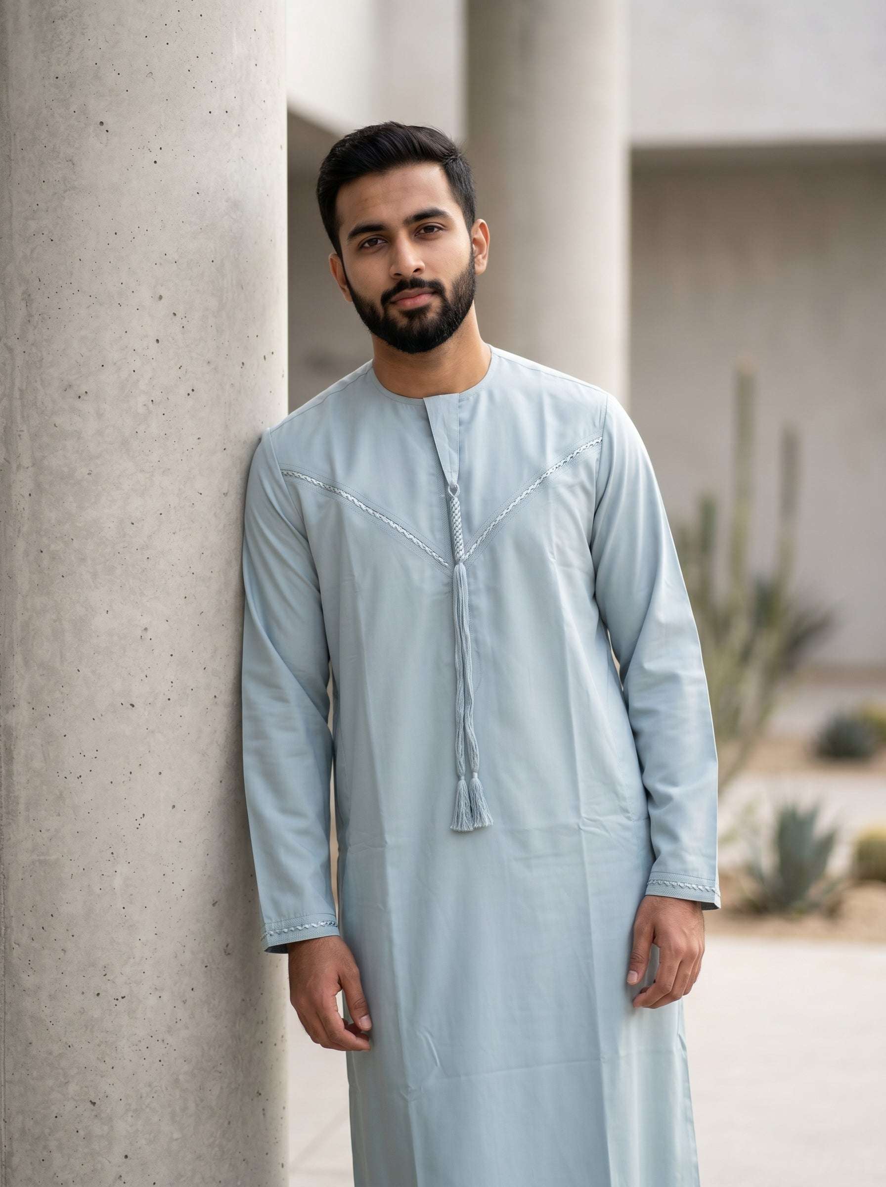 Ice blue Emirati thobe for men, close-up of the fabric