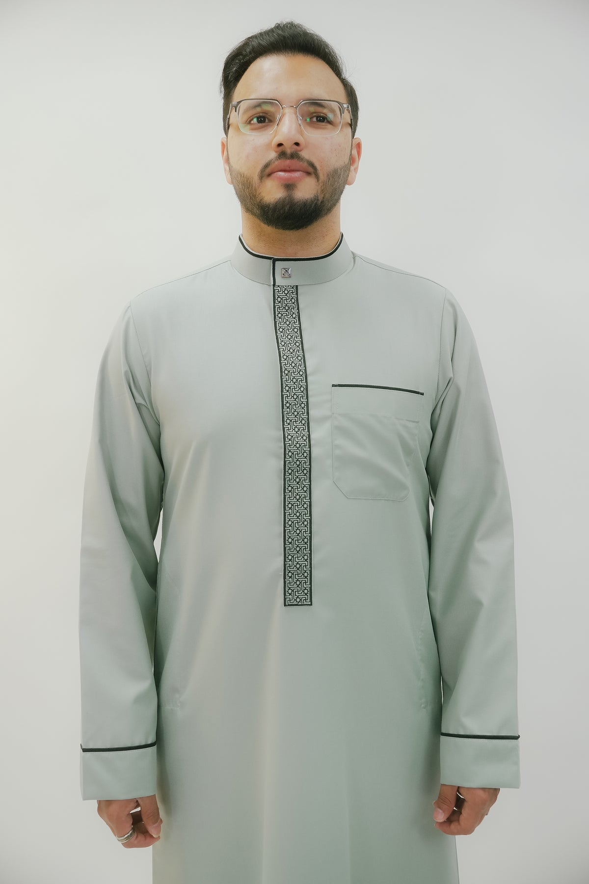 Light green thobe with embroidered collar for men, full front view