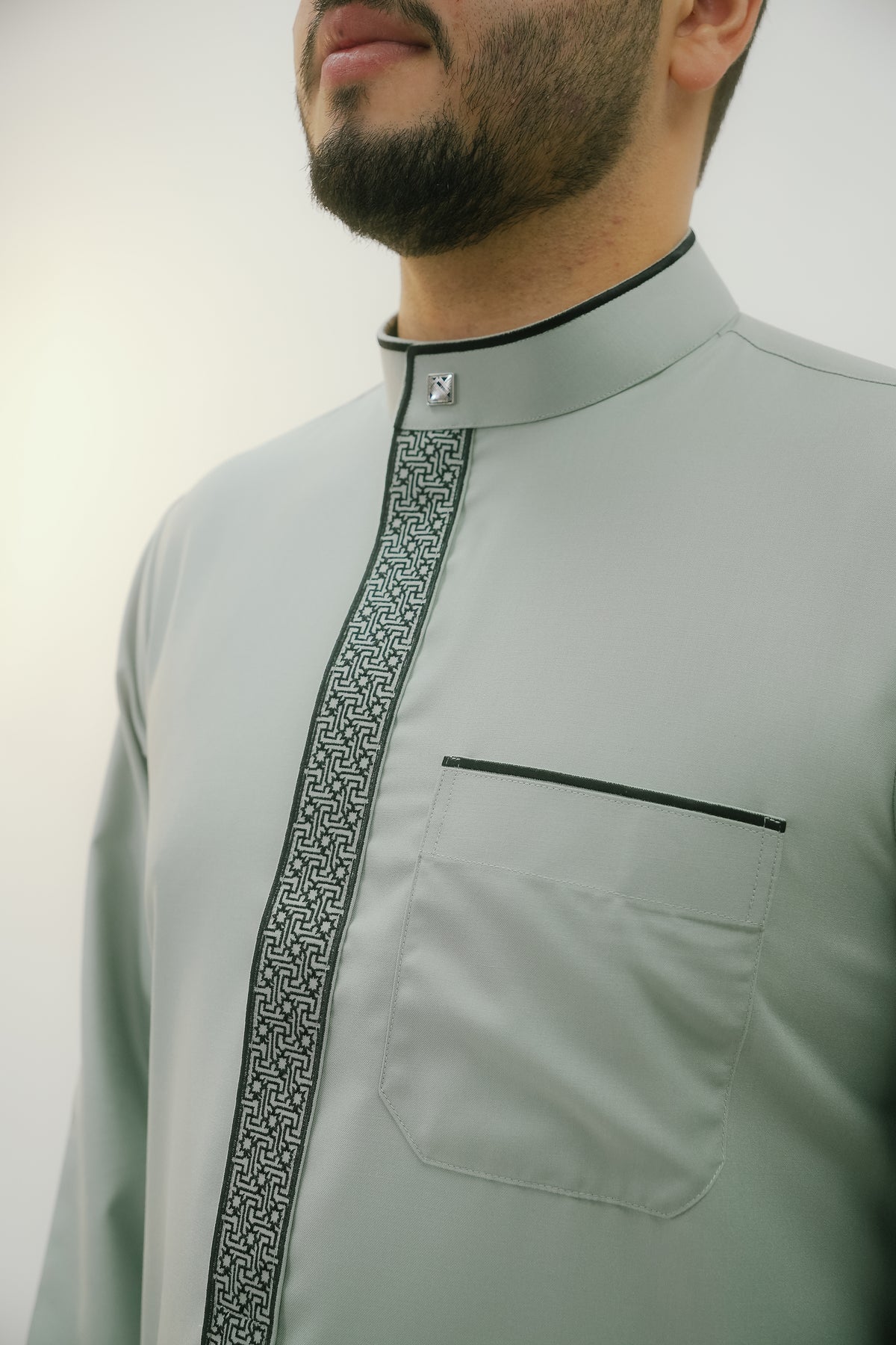 Light green thobe with embroidered collar for men, another view of the full length