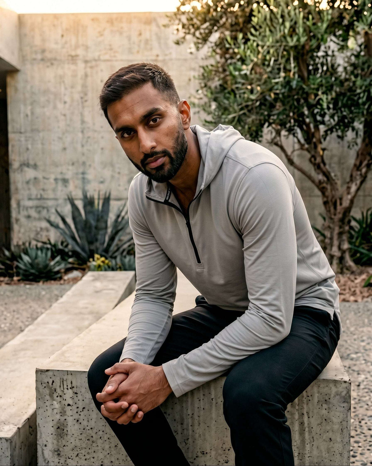 Light grey hooded kurta with half-zip jersey for men, shown from the side