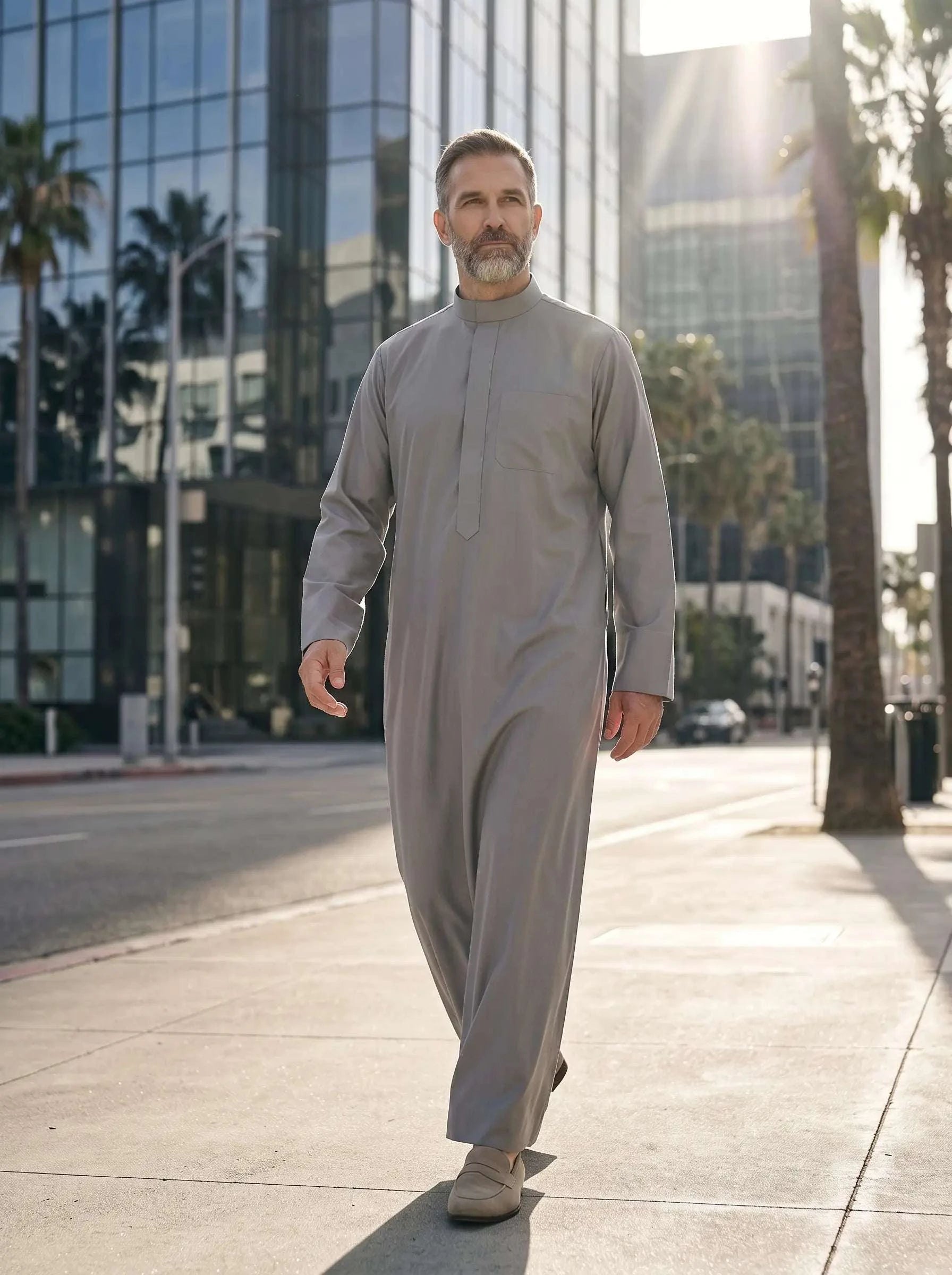 Light grey minimalist thobe with hidden placket for men, full front view