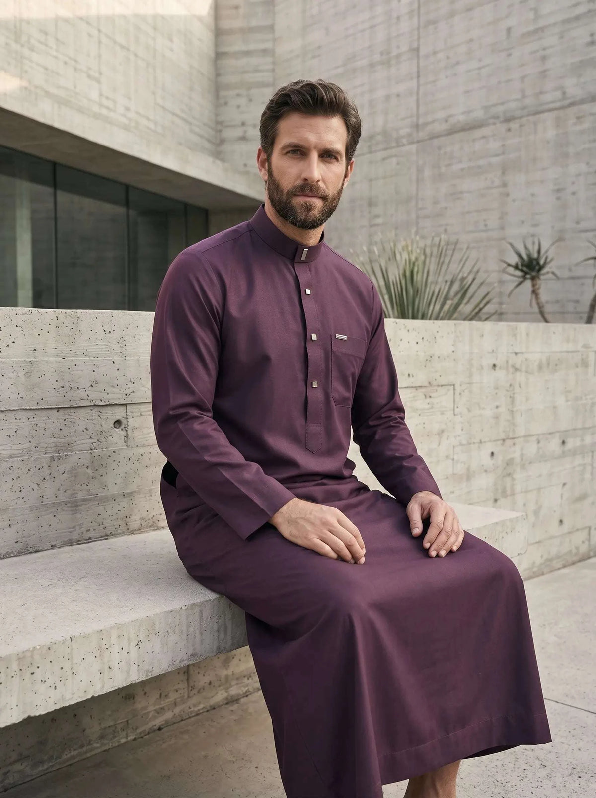 Maroon minimalist thobe for men, side profile view