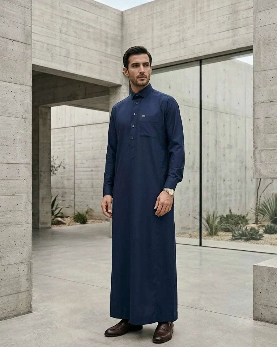 Navy blue thobe with shirt collar for men, showing the length and sleeve line