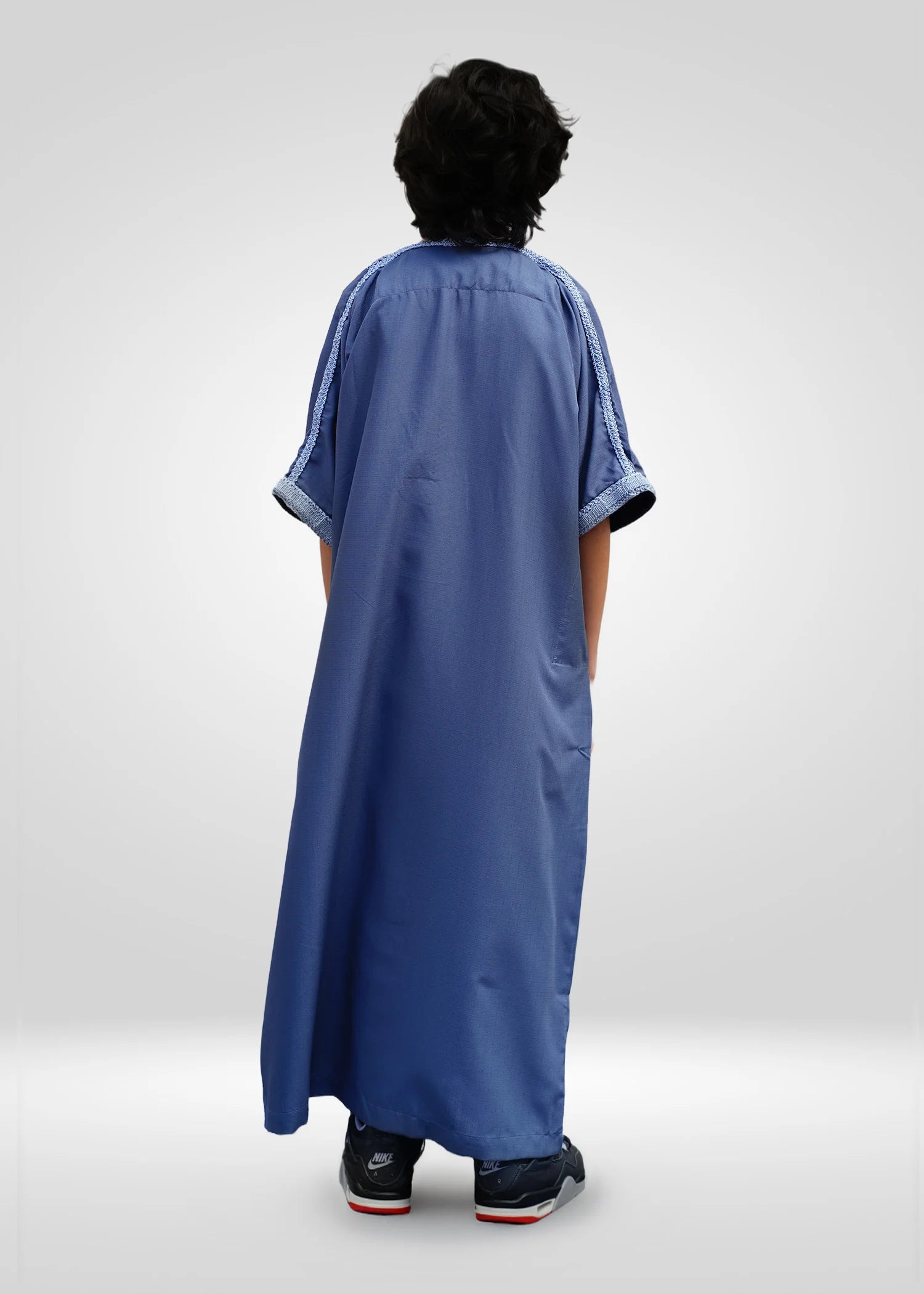 Moroccan V-Neck Close Up, Clean Finish, Tonal Blue Design.