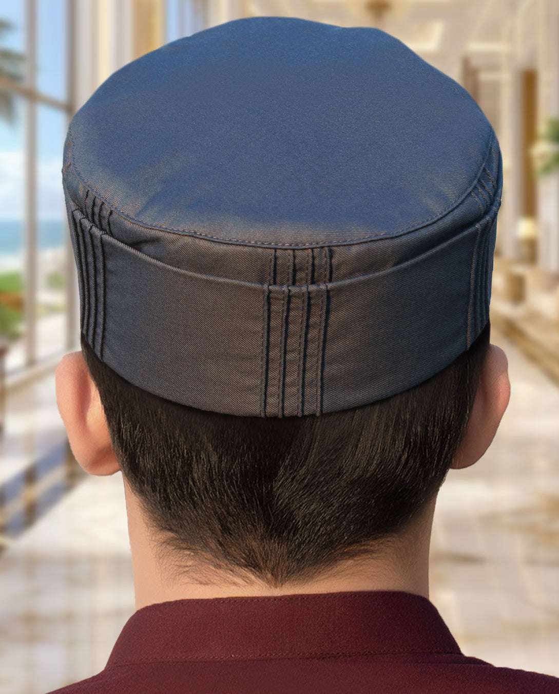 Dark grey pleated structured kufi prayer cap for men, stitched surface in close detail
