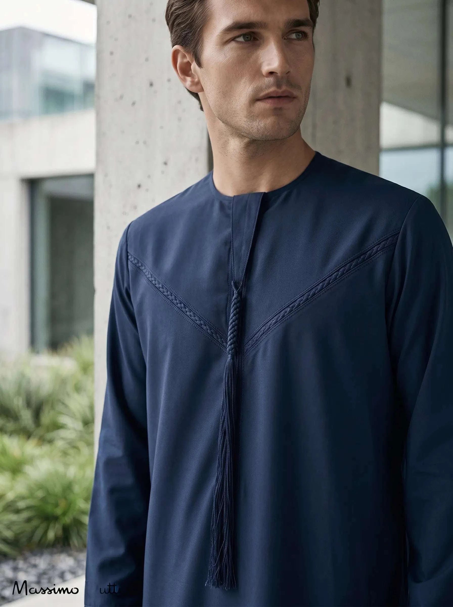 Navy blue Emirati thobe with braided tarboush for men, close-up of the fabric