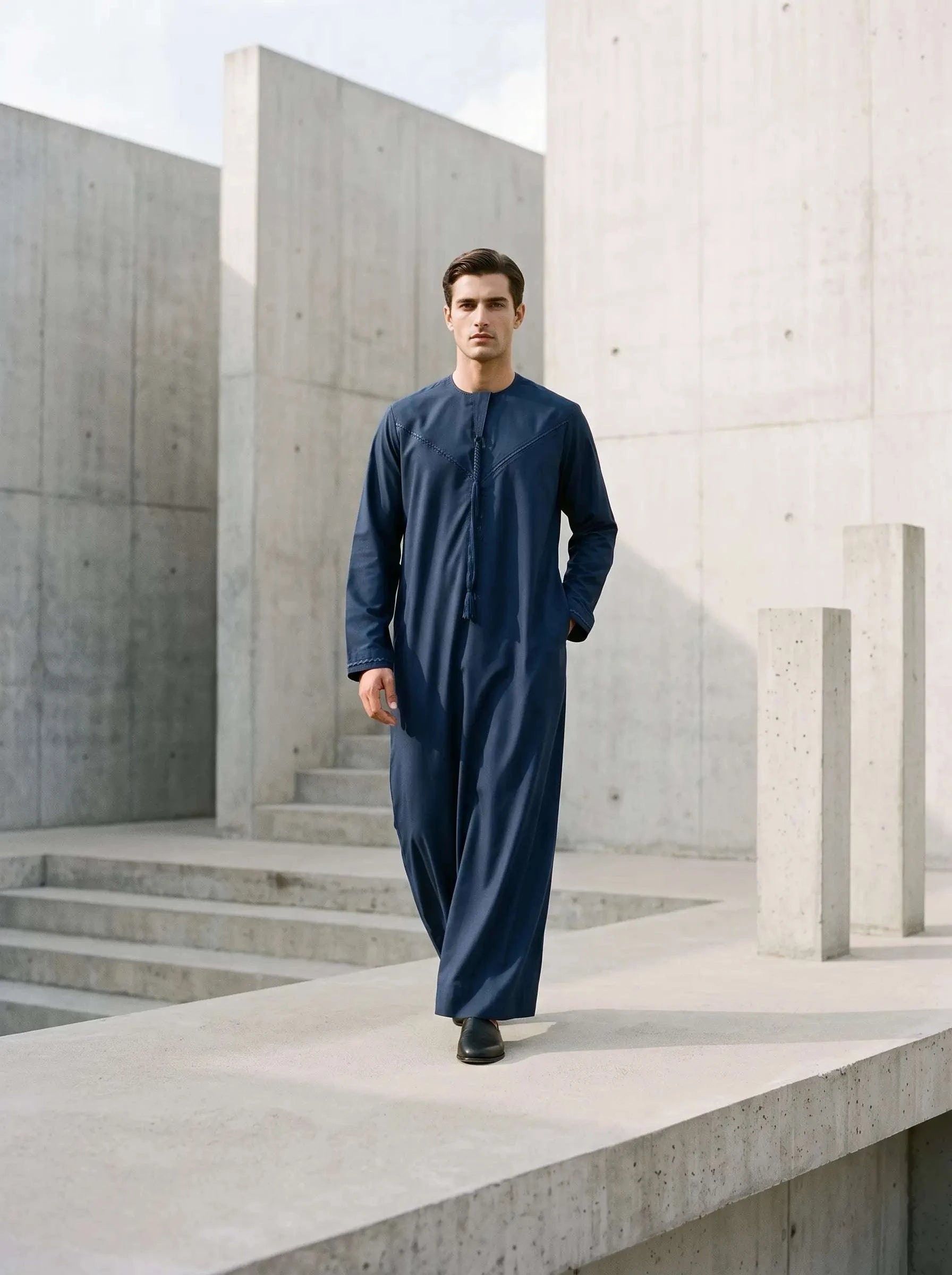 Navy blue Emirati thobe with braided tarboush for men, another full-length view