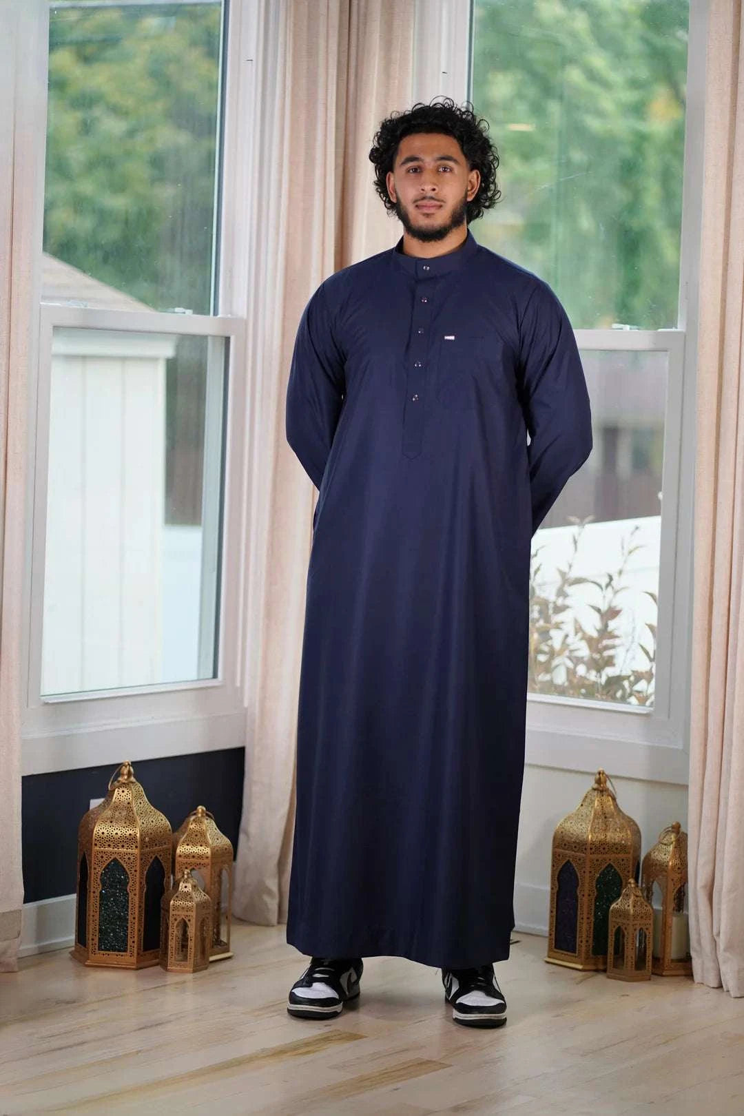 Navy blue thobe with mandarin collar for men, back view