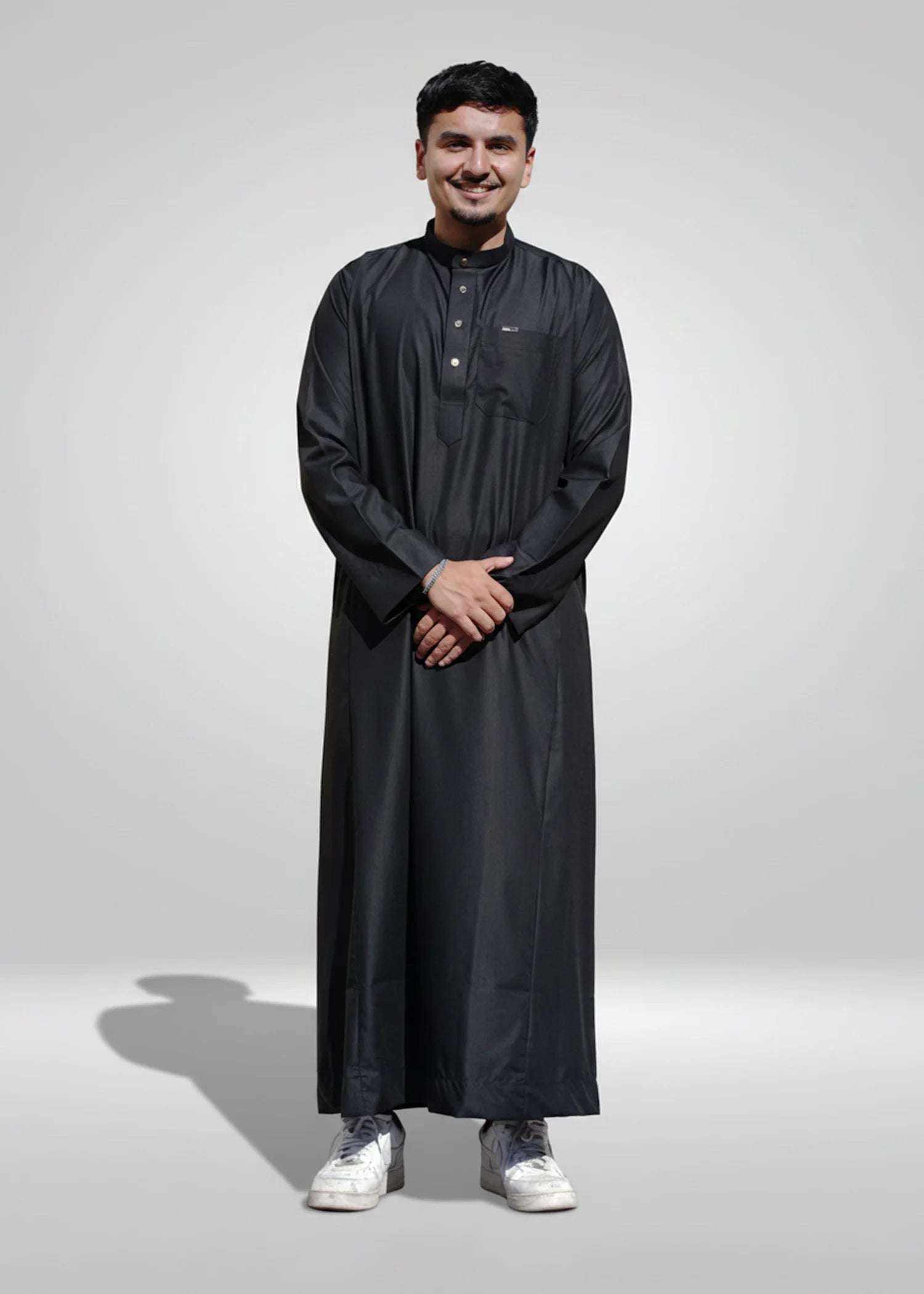 Front view of the Plain Black Thobe showing the sleek design and mandarin collar
