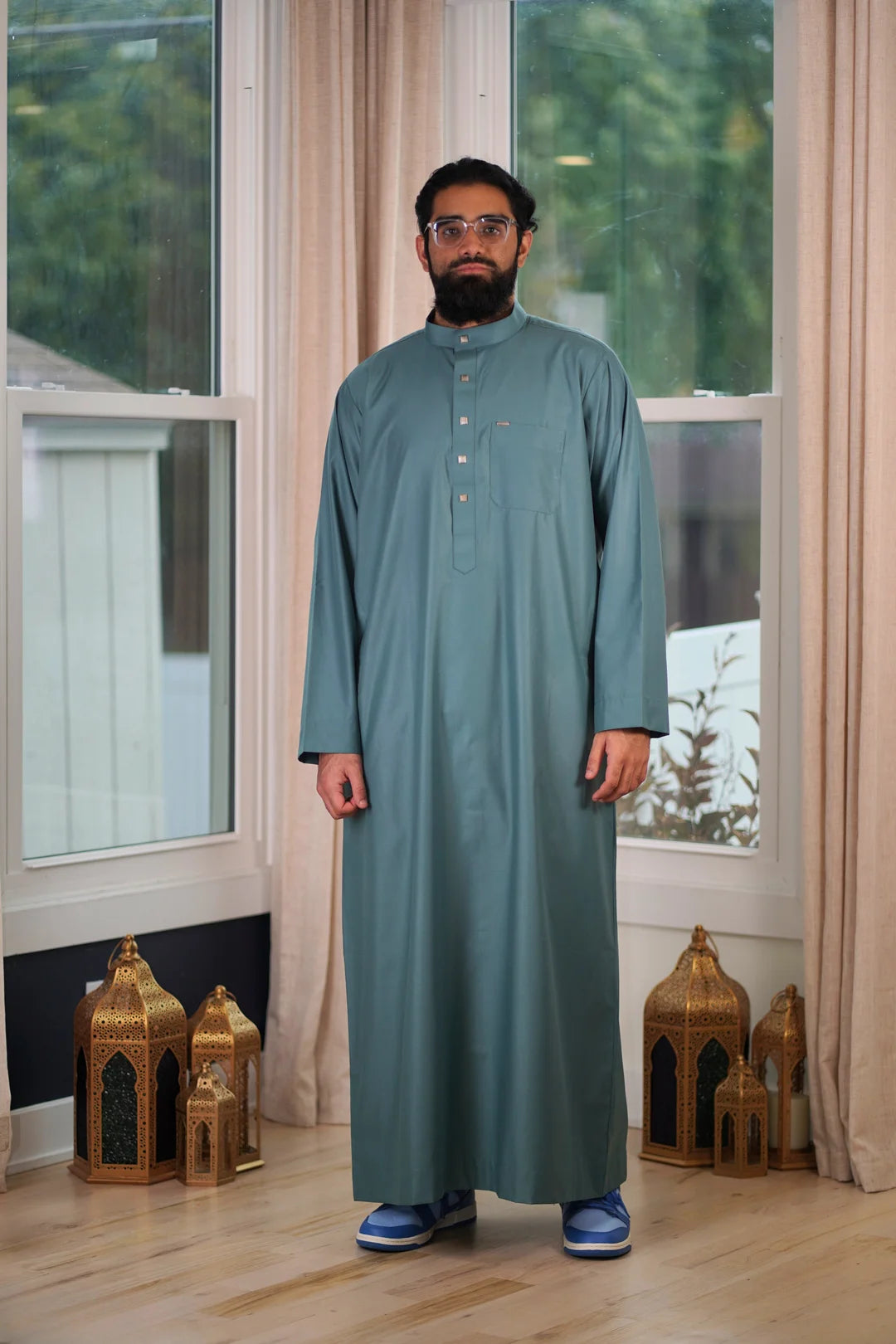 Front view of the Plain Sage Green Thobe showing the calming color and mandarin collar