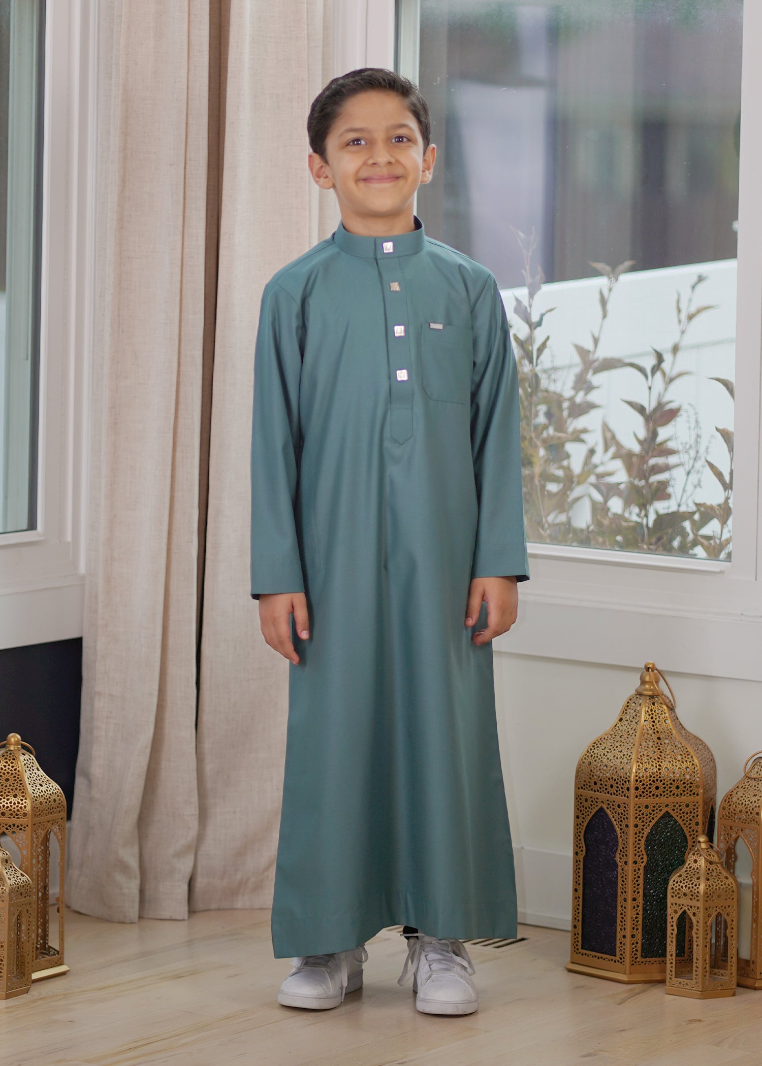 Front view of the Plain Slate Green Kids Thobe showing the relaxed fit and earth-toned color
