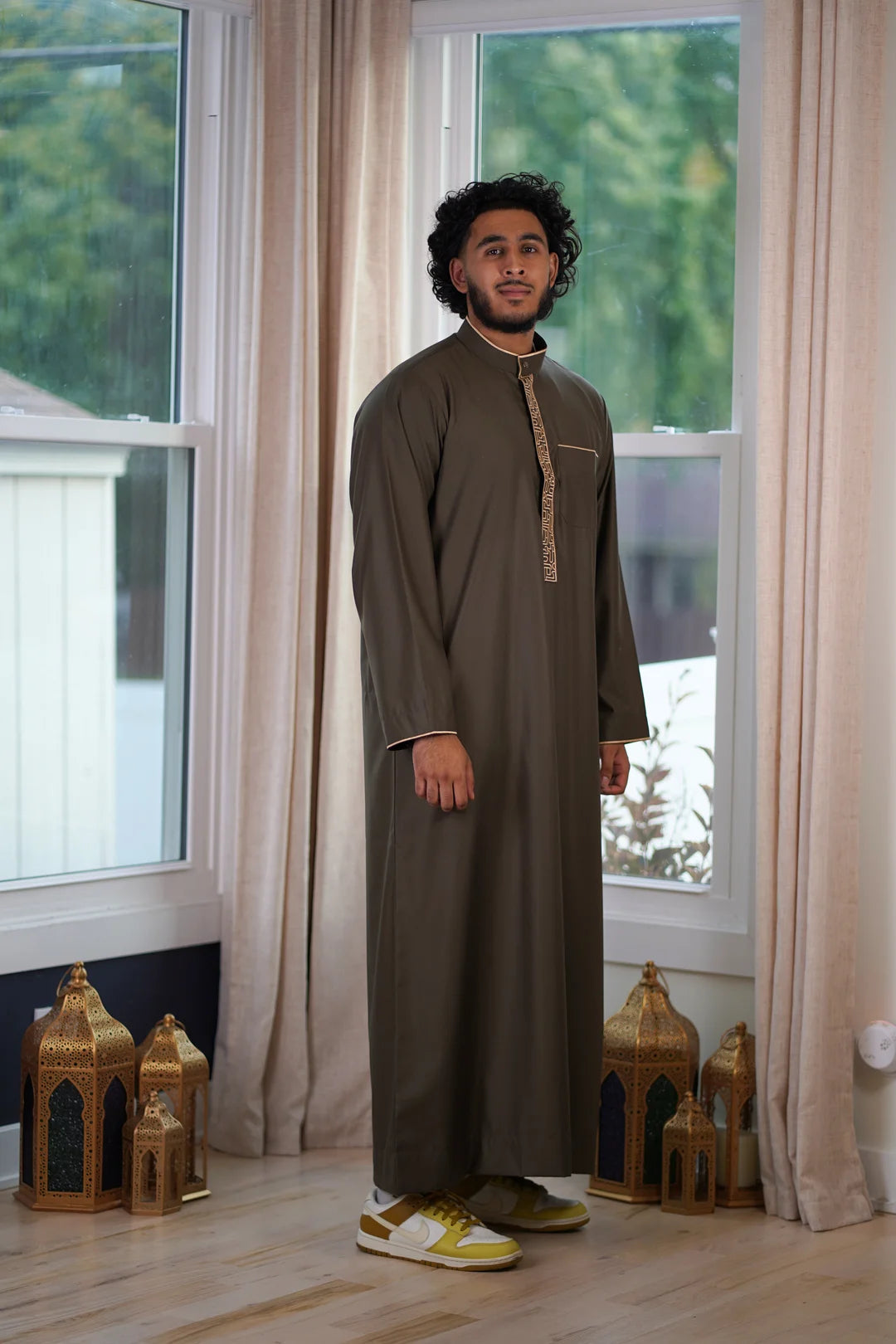 Model wearing the thobe in a lifestyle setting, emphasizing premium Muslim Thobe for Formal wear and US-wide delivery.