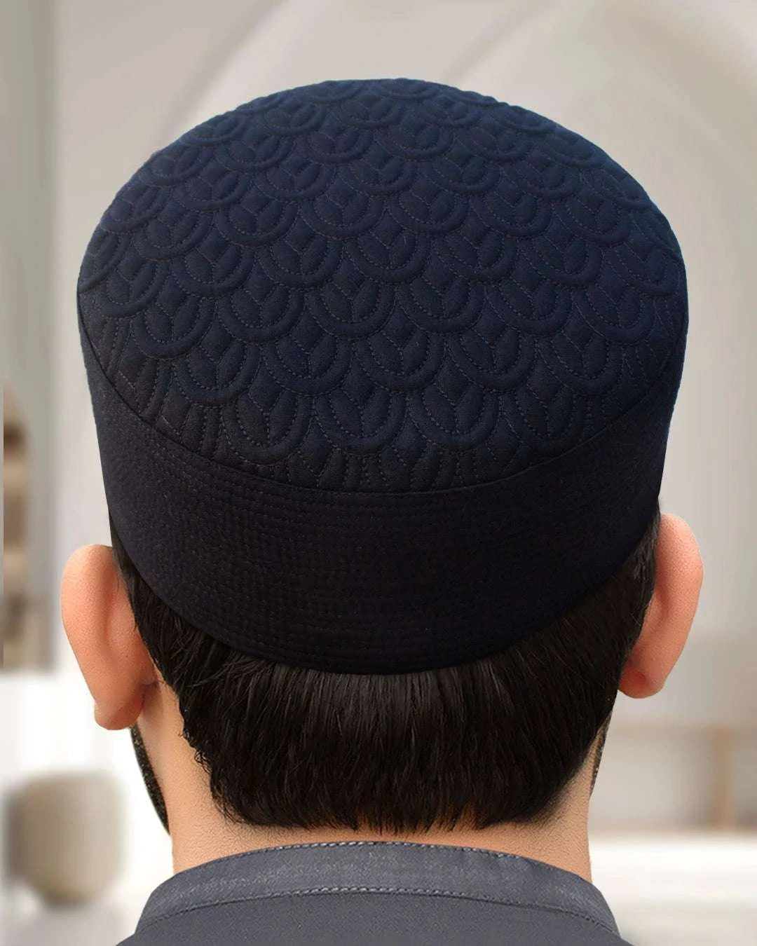 Navy blue embroidered kufi prayer cap for men, styled for Eid and Jumuah