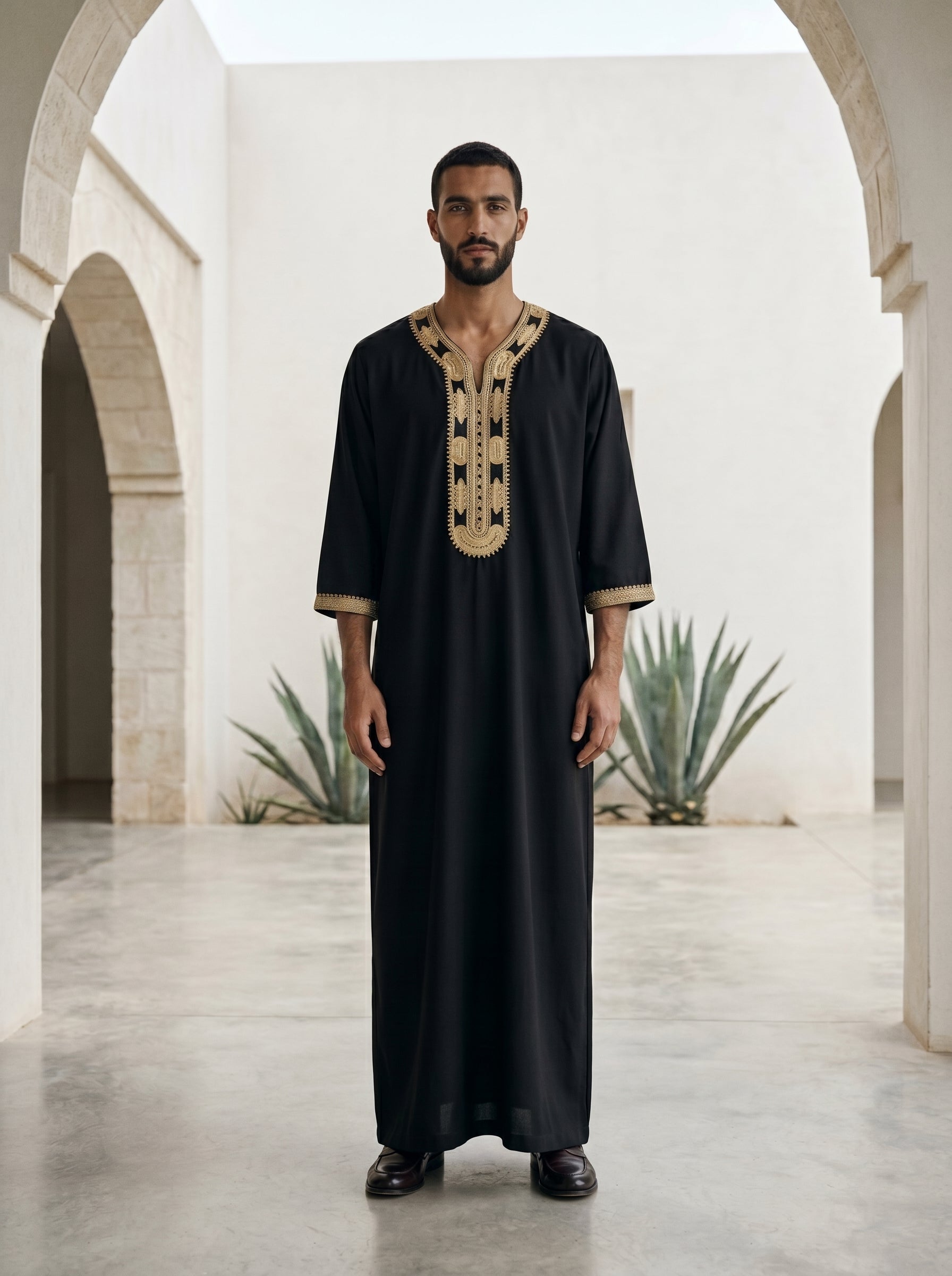 Royal black and gold Moroccan thobe for men, heavy panel embroidered jubbah, traditional Islamic clothing, modest menswear, designer Sunnah wear, formal Eid outfit, authentic Arab dress, black summer gandora, luxury Muslim fashion.