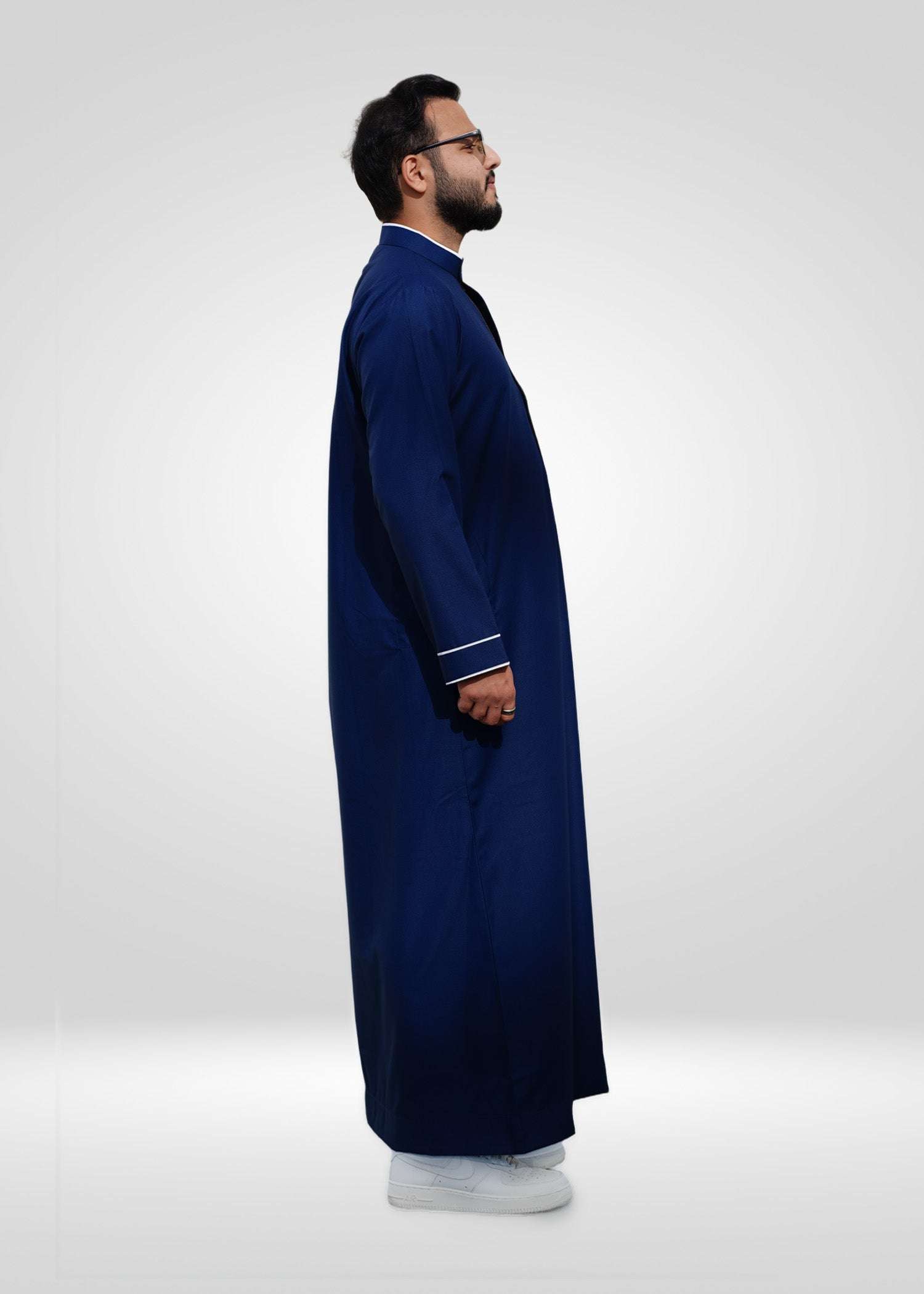 Royal blue and white embroidered thobe with mandarin collar for men, back view
