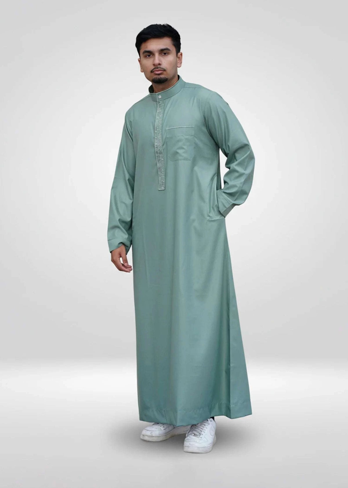 Sage green embroidered thobe with mandarin collar for men, side profile view