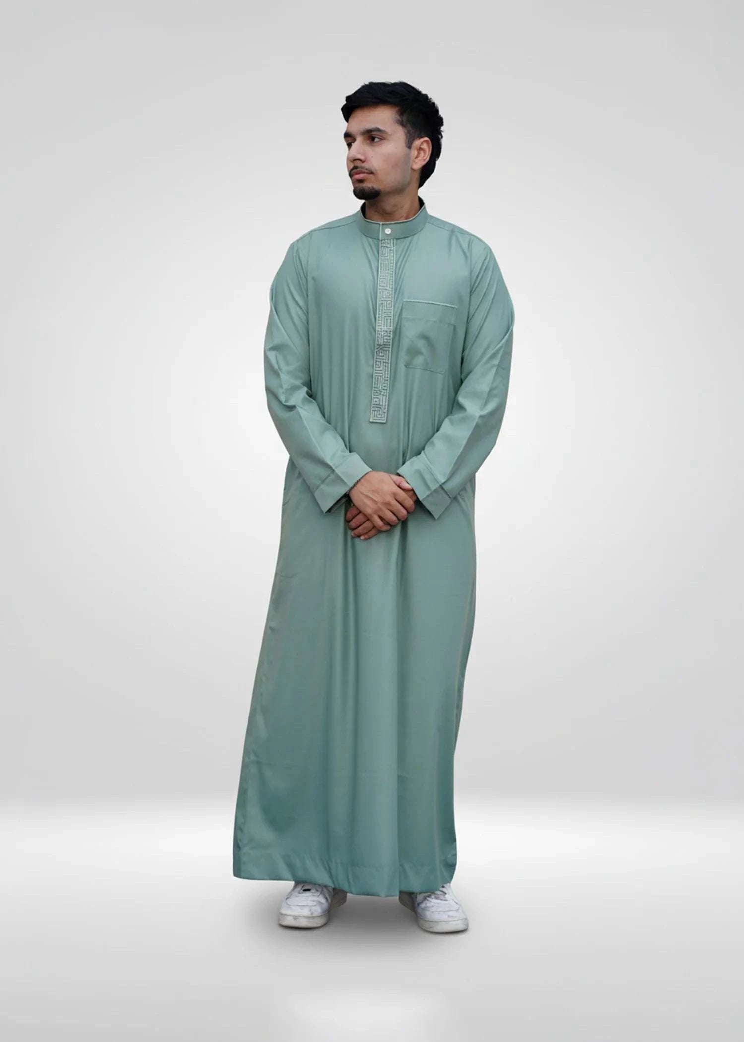 Sage green embroidered thobe with mandarin collar for men, stitched pattern in close detail