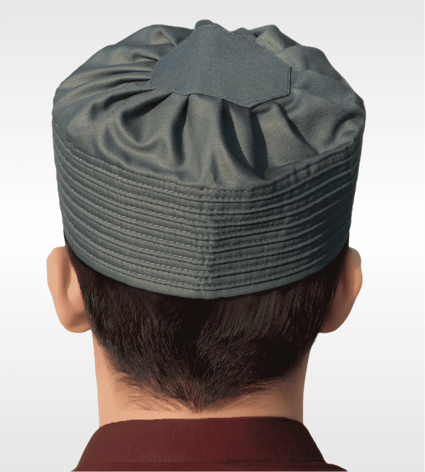 Gray pleated gathered kufi prayer cap for men, stitched surface in close detail