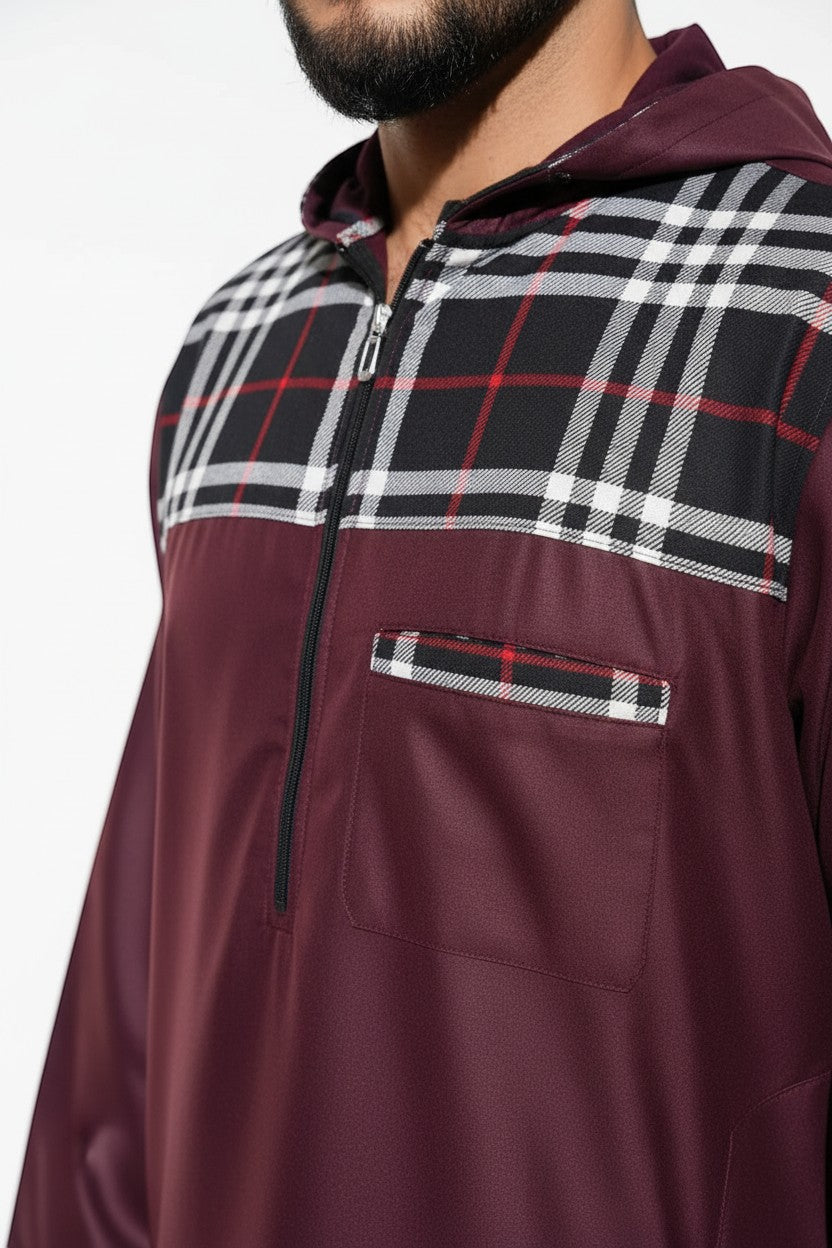 The Topi Wala maroon checkered hoodie thobe for men features a black and white plaid pattern on the hood, shoulders, and chest pocket.