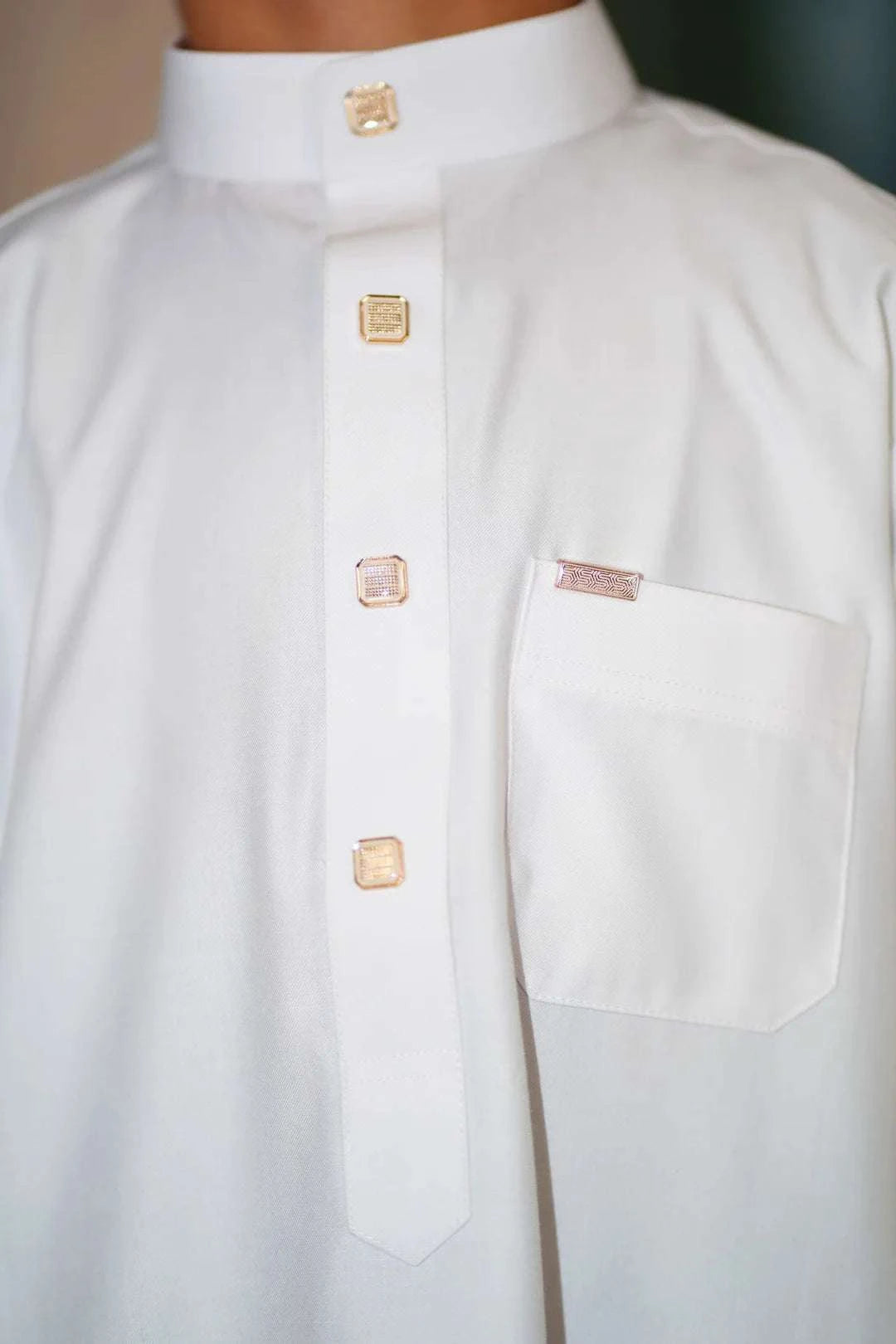 White thobe with contrast button placket for boys, side profile view