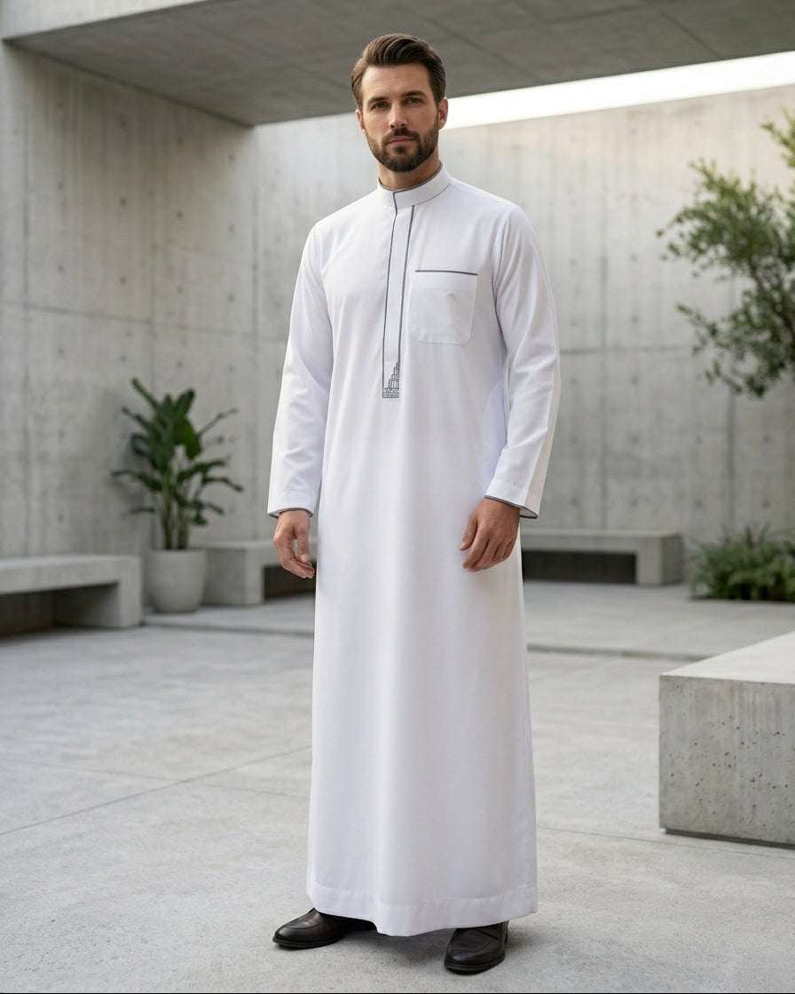 White executive thobe with grey accents for men, close-up of the embroidered detailing