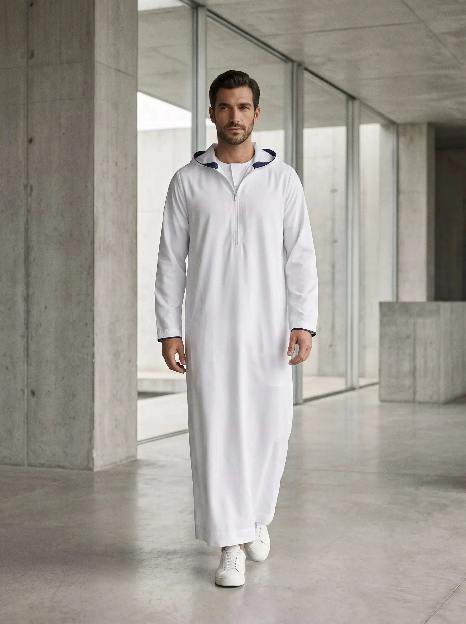 White hooded sport thobe with half-zip for men, close-up of the zip pull