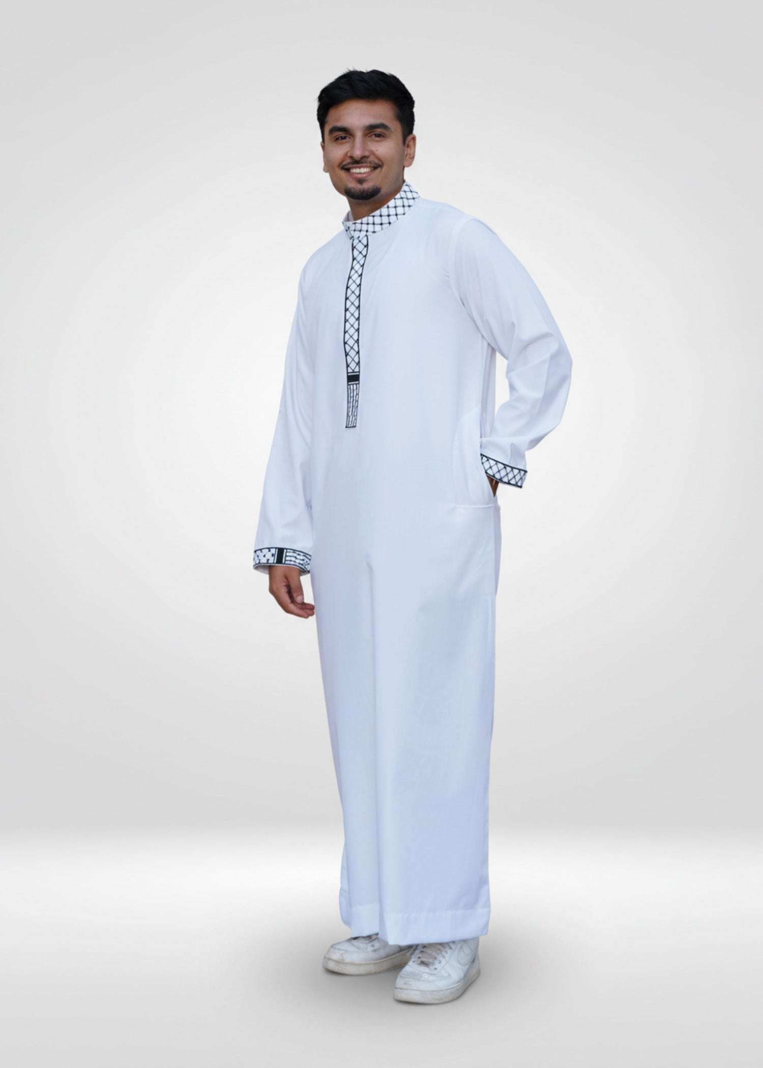 White Palestine embroidered thobe with Kufiya detailing for men, side profile view